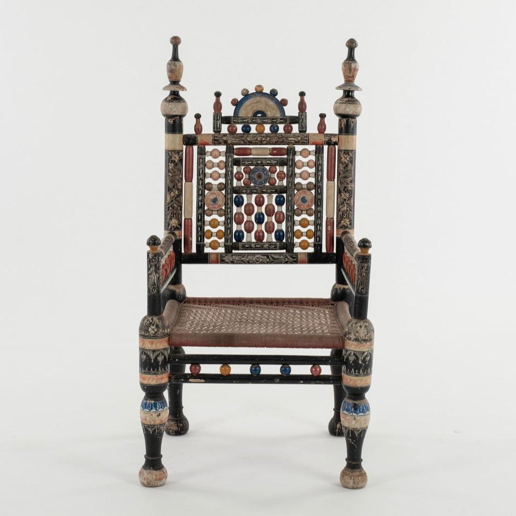A beautiful 19th century hand carved and painted Punjabi chair.