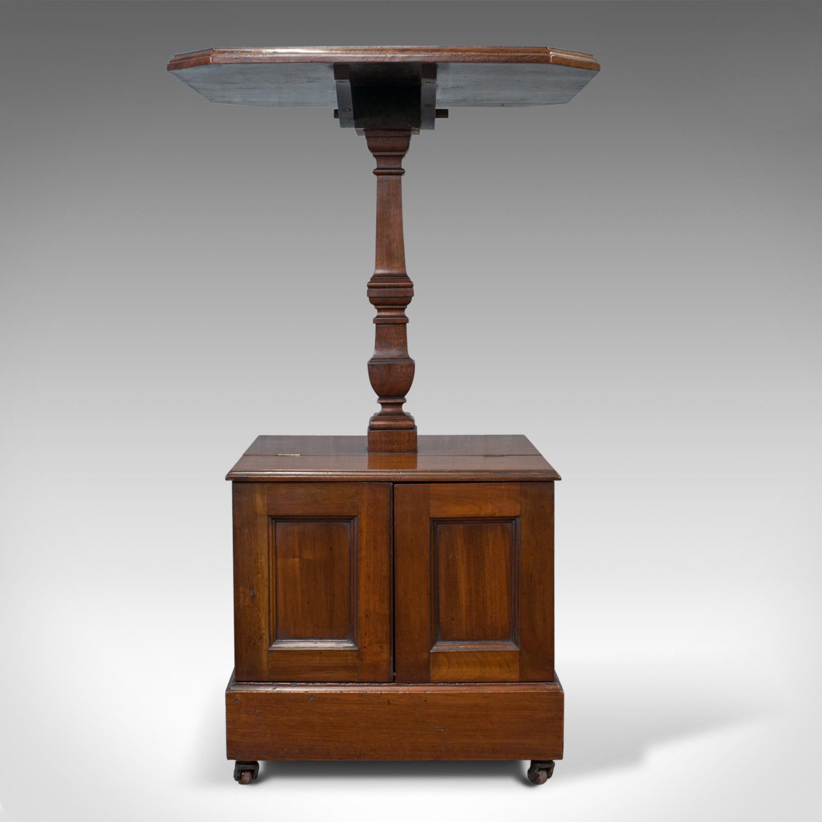 This is an antique purdonium, a til-top table and coal box. An English, Edwardian, walnut side table dating to the early 20th century, circa 1910.

A fascinating Edwardian example in very good condition
Walnut displays fine colour and grain