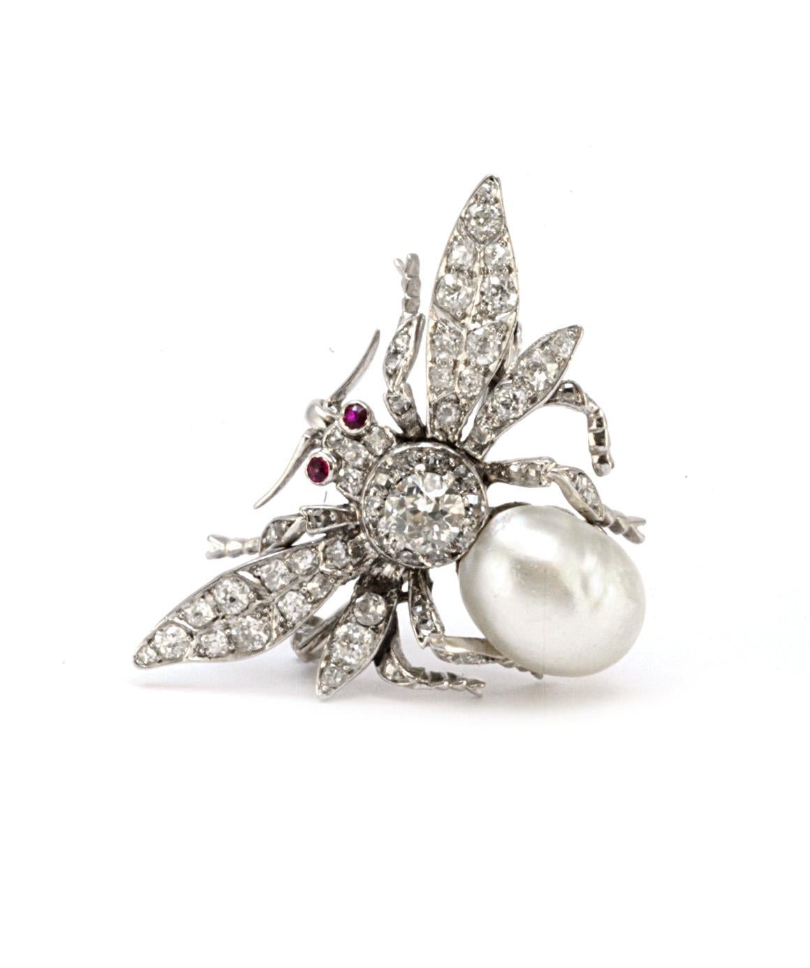 Pure Platinum Bug Brooch with Genuine Ruby and Pearl in Excellent Condition! This bee brooch is pure platinum, and the pin fastener is 14K White Gold. The bee has rubies for eyes, approximately .028CTTW, and a pearl abdomen about 13.53ct. There are