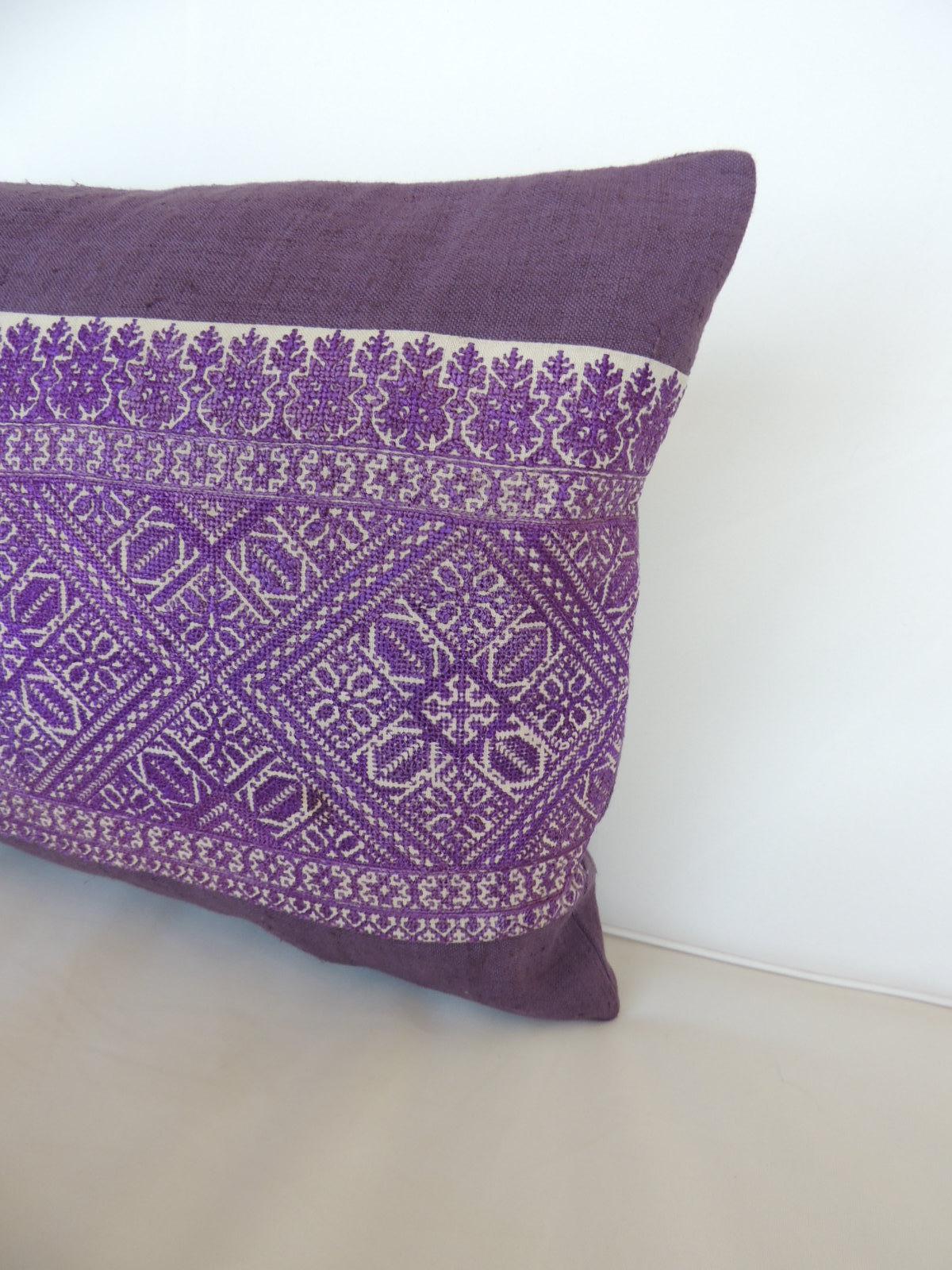 Decorative bolster pillow handcrafted with an artisanal textile from the fiber arts tradition of Morocco.
The purple Fez embroidery was framed in the front with a homespun vintage dusty purple linen.
Same dusty purple linen as