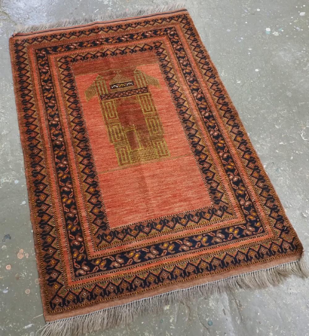 Antique Afghan Qarqeen Turkmen prayer rug with unusual mosque design
Circa 1920

A very interesting small prayer rug by the Turkmen people settled around the town of Qarqeen, in Northern Afghanistan near to the border with Southern Turkmenistan The
