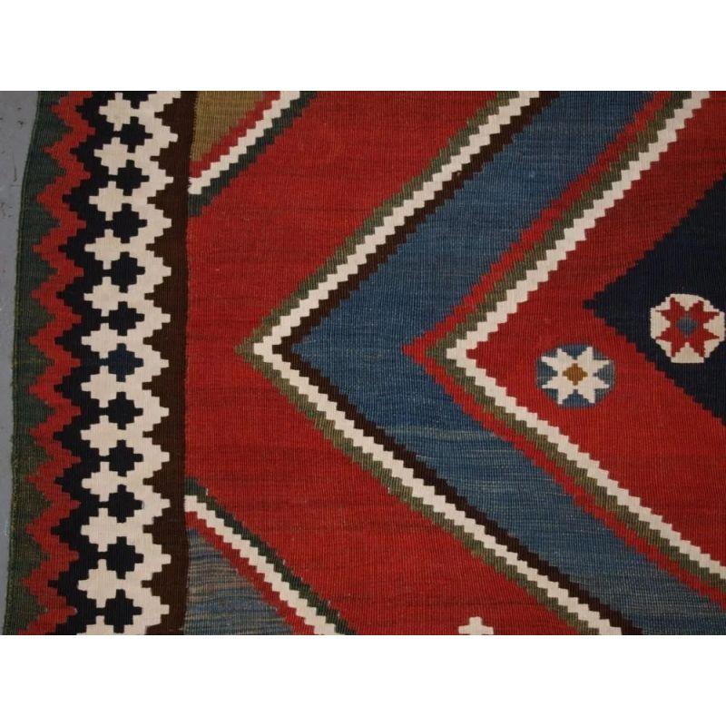 Asian Antique Qashqai Kilim with Bold Graphic Design, Late 19th Century For Sale