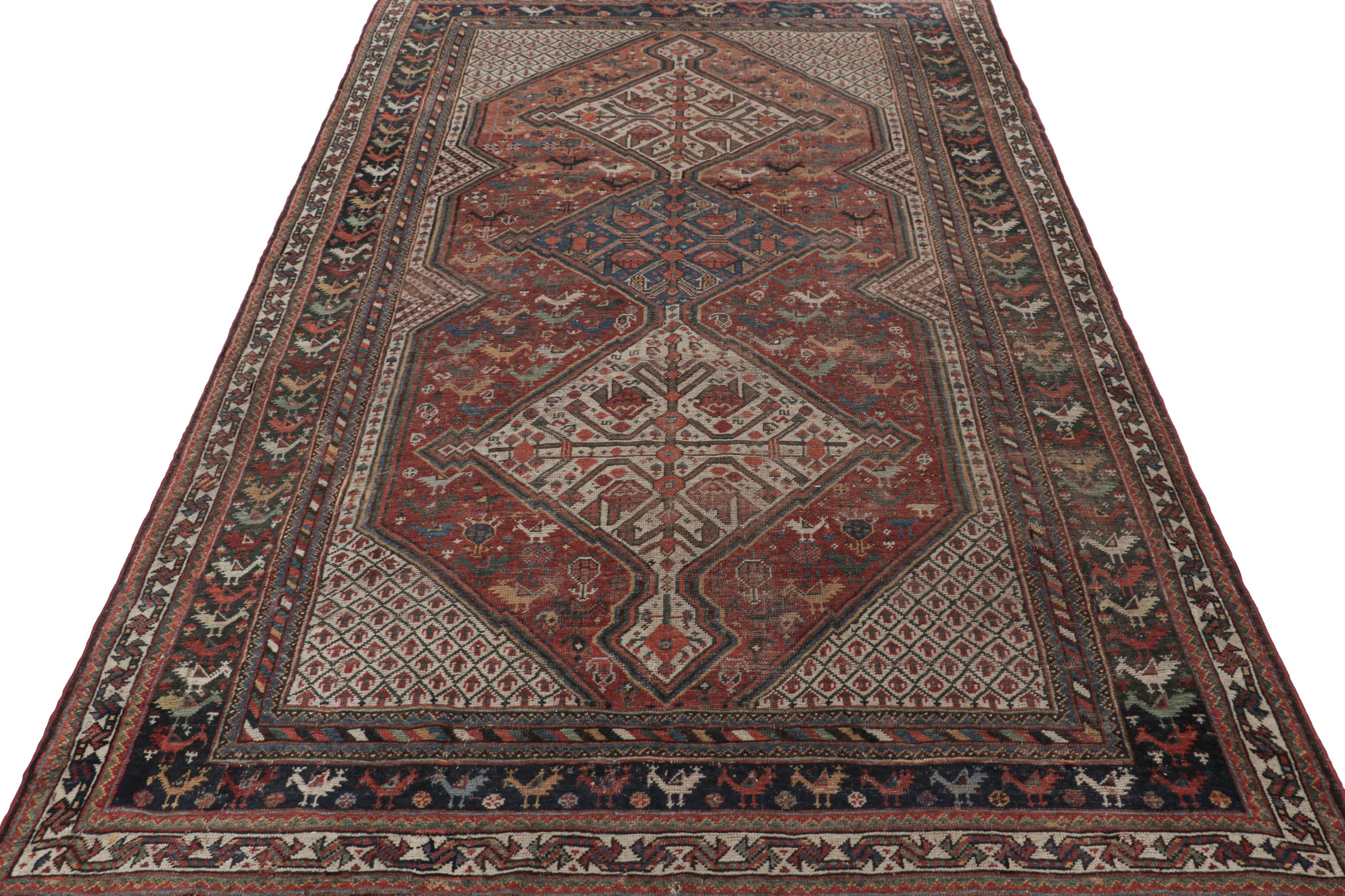 Perse Tapis polychrome Qashqai ancien avec médaillons et photos - Tapis et Kilim en vente