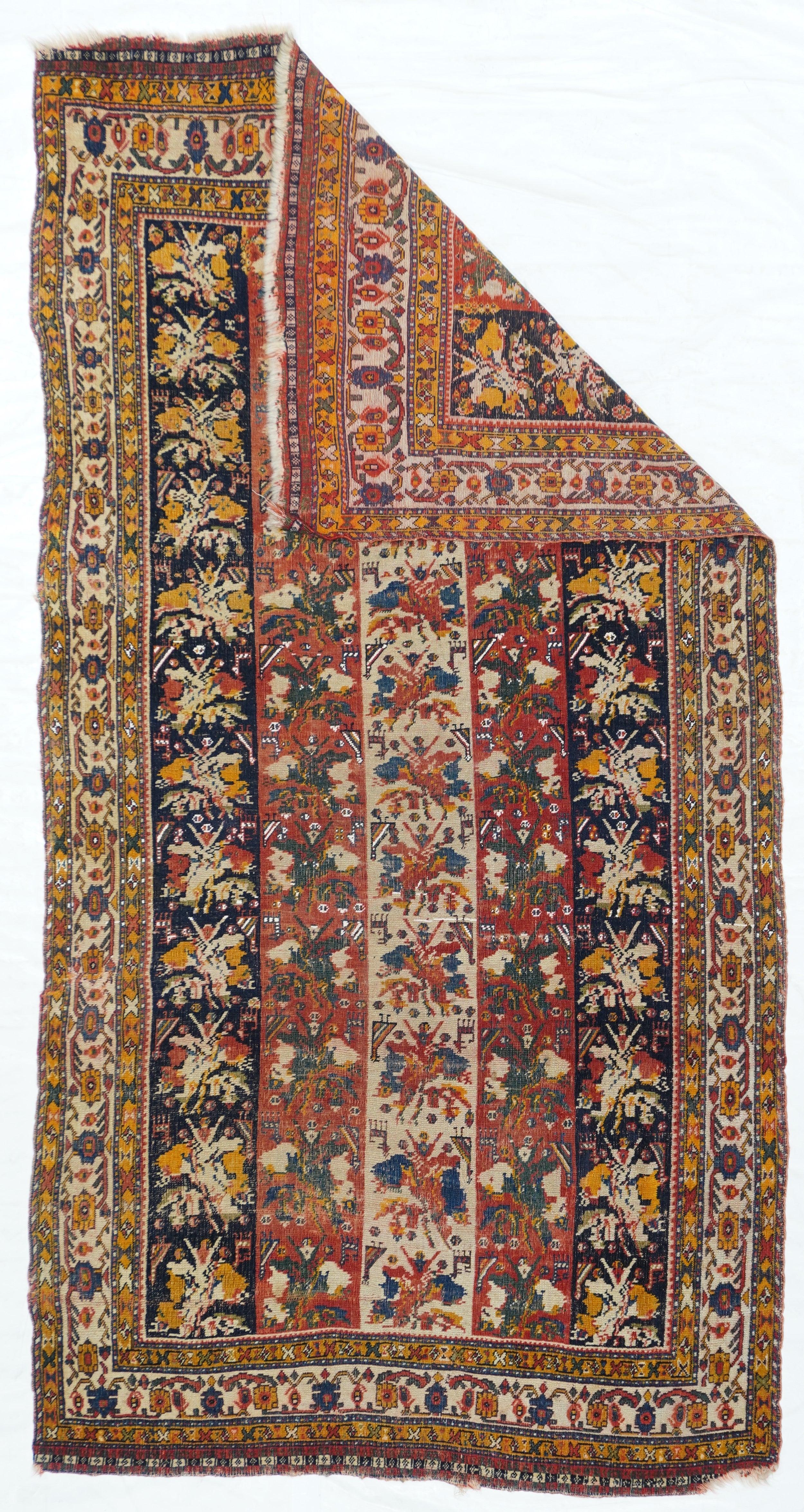 Antique Qashqai rug measures: 3'7'' x 7'1''.