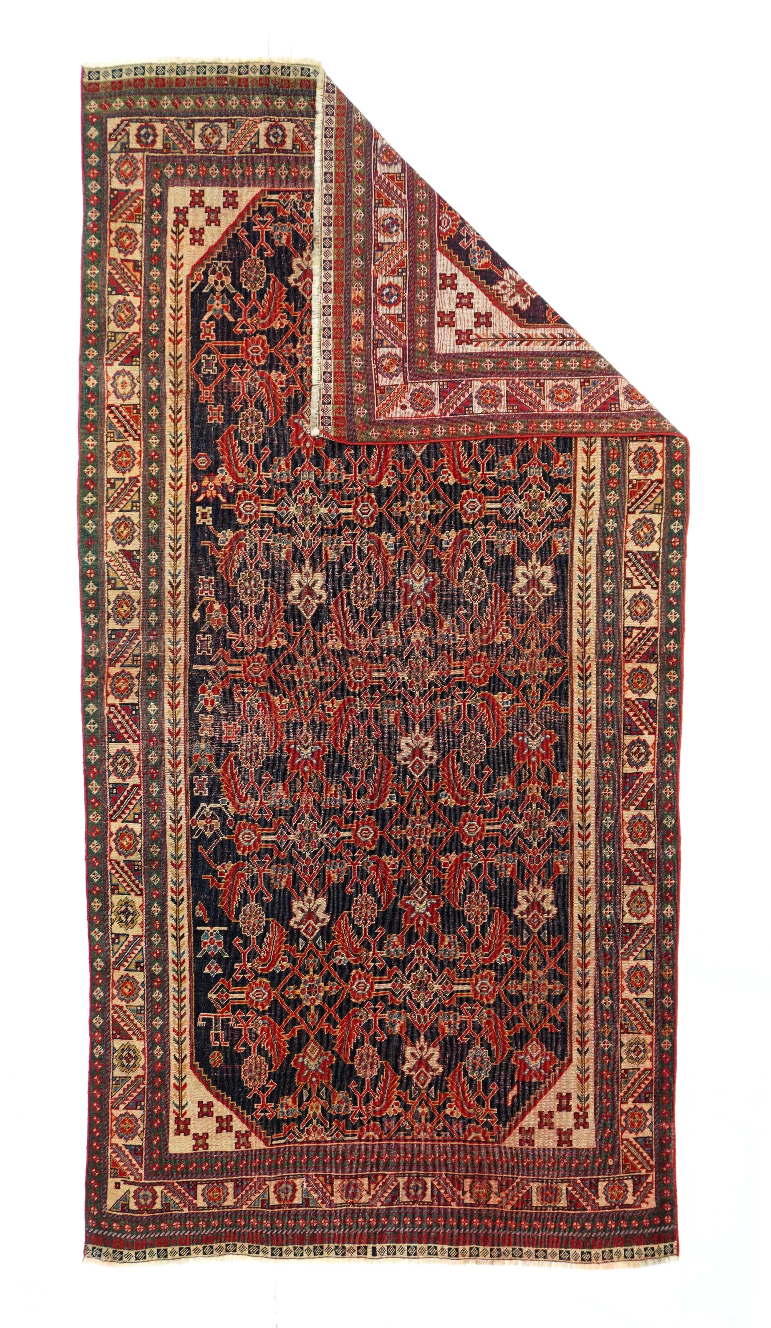 Antique Qashqai rug measures: 3'8'' x 7'7''.