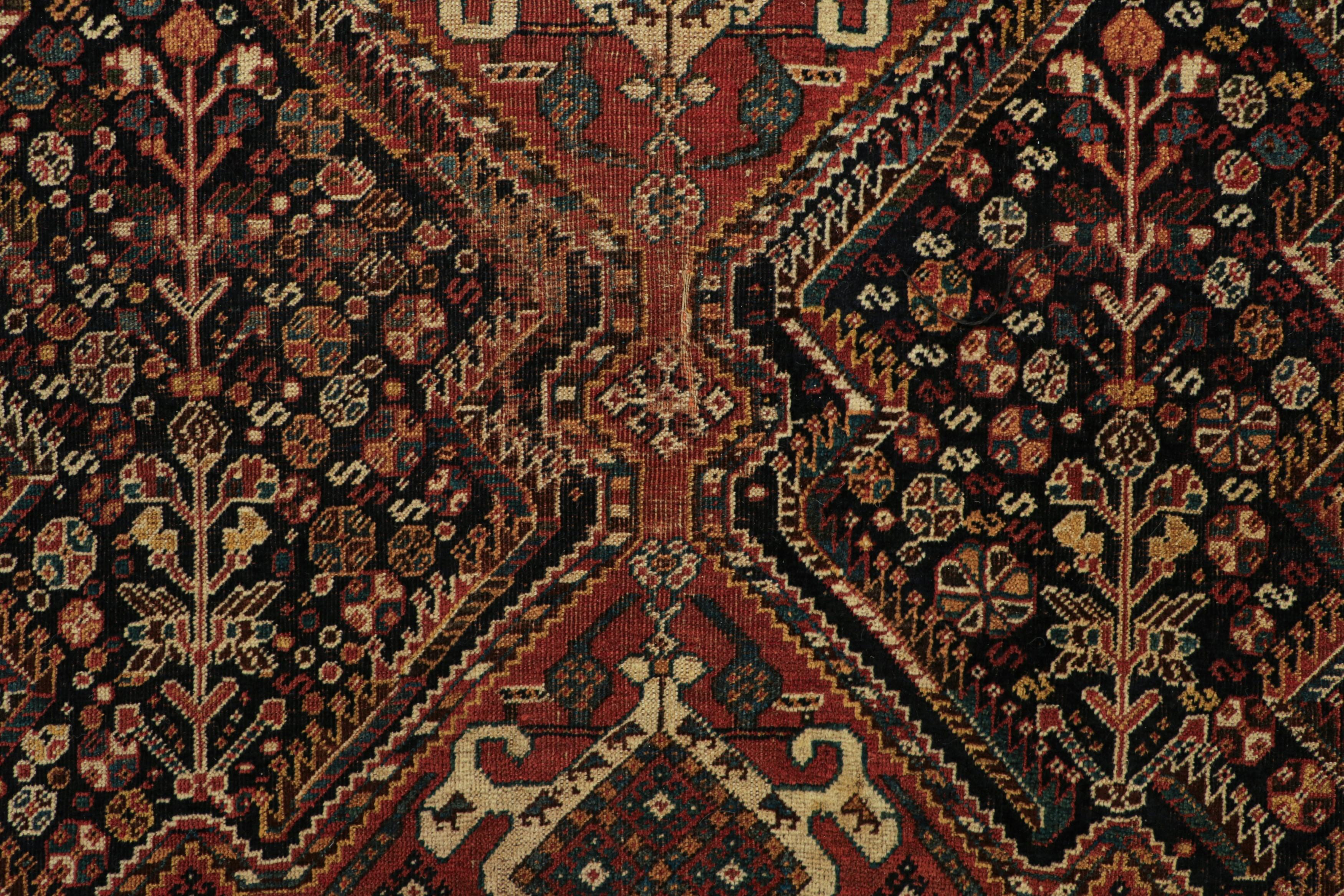 Tribal Antique Qashqai Rug in Red and Black with Medallions by Rug and Kilim For Sale