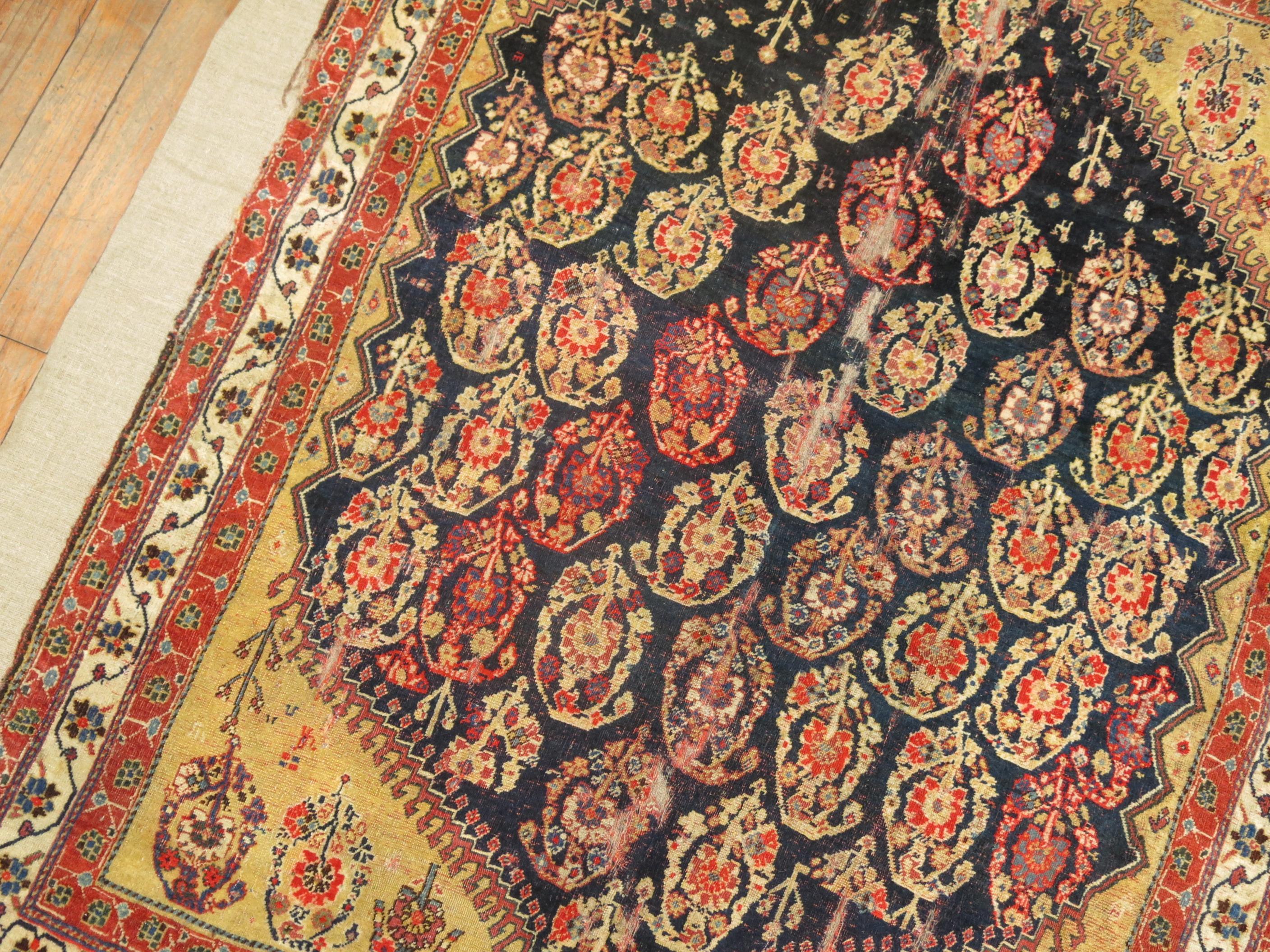 Alfombra antigua Qashqai cosida sobre lino siglo XIX en venta