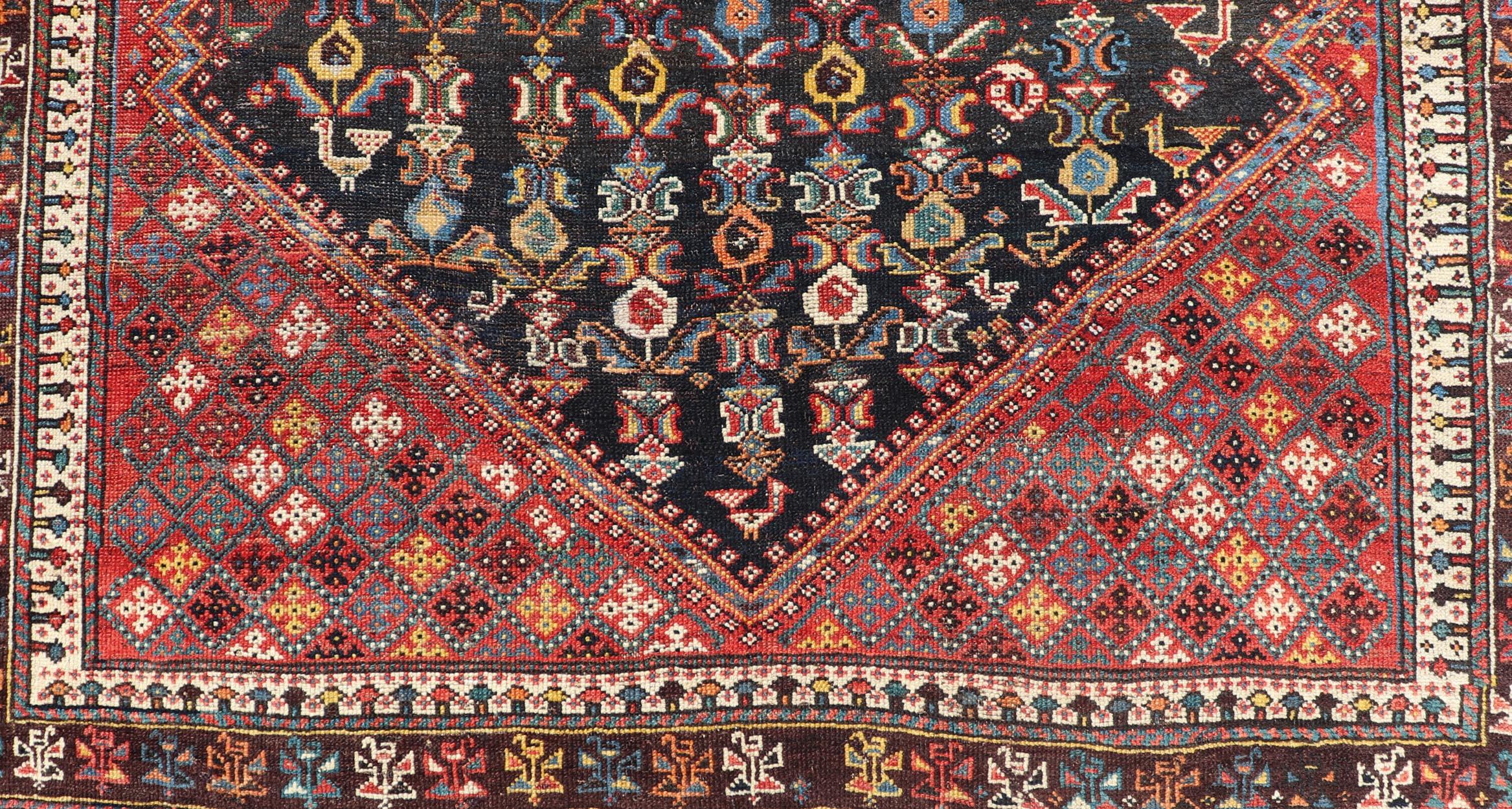 Hand-Knotted Antique Qashqai Tribal Rug With Medallion in Blue and Red 5'7 x 8'10 For Sale