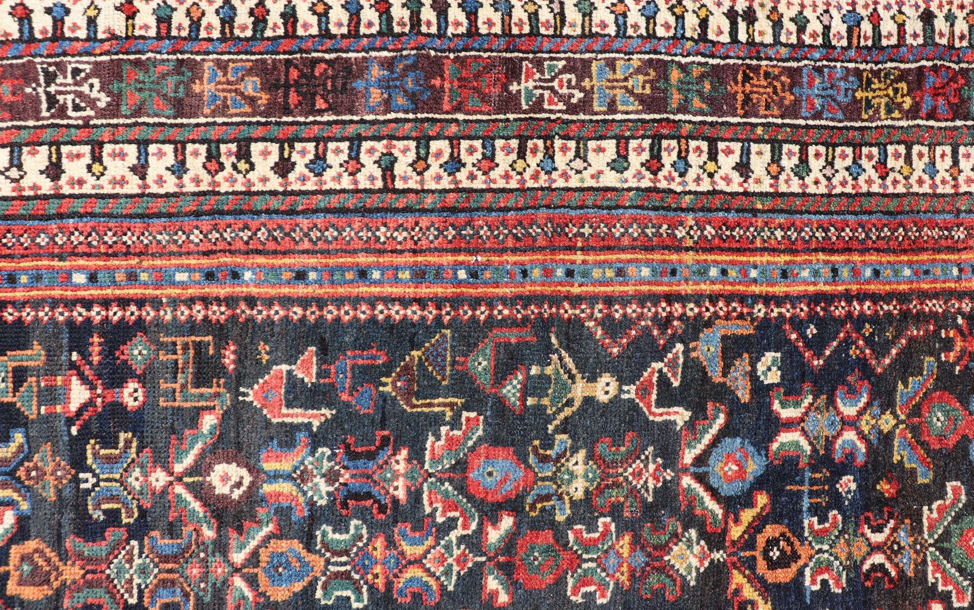 Wool Antique Qashqai Tribal Rug With Medallion in Blue and Red 5'7 x 8'10 For Sale