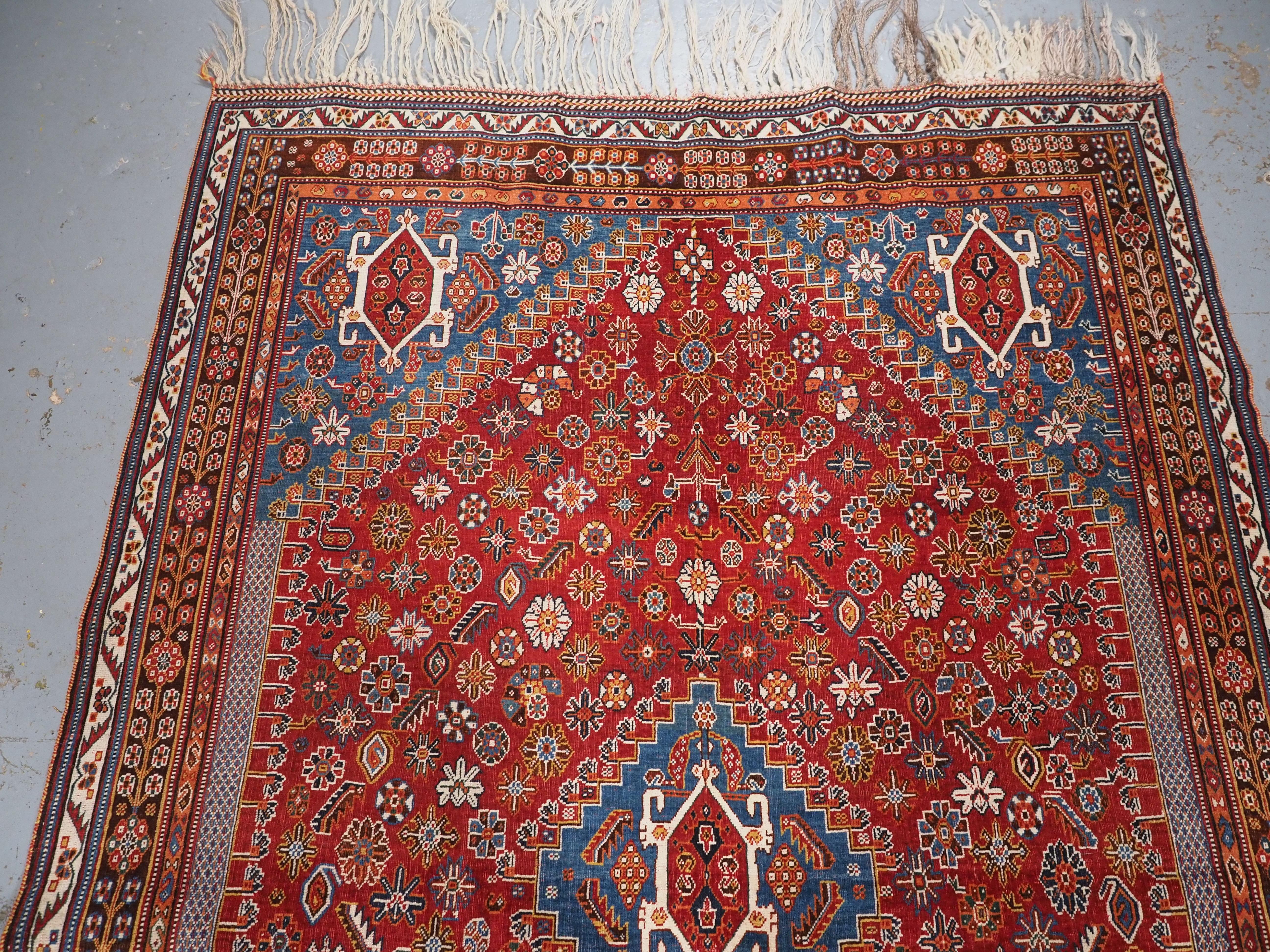 Caucasian Antique Qashqai tribal rug with small central medallion.  Circa 1890. For Sale