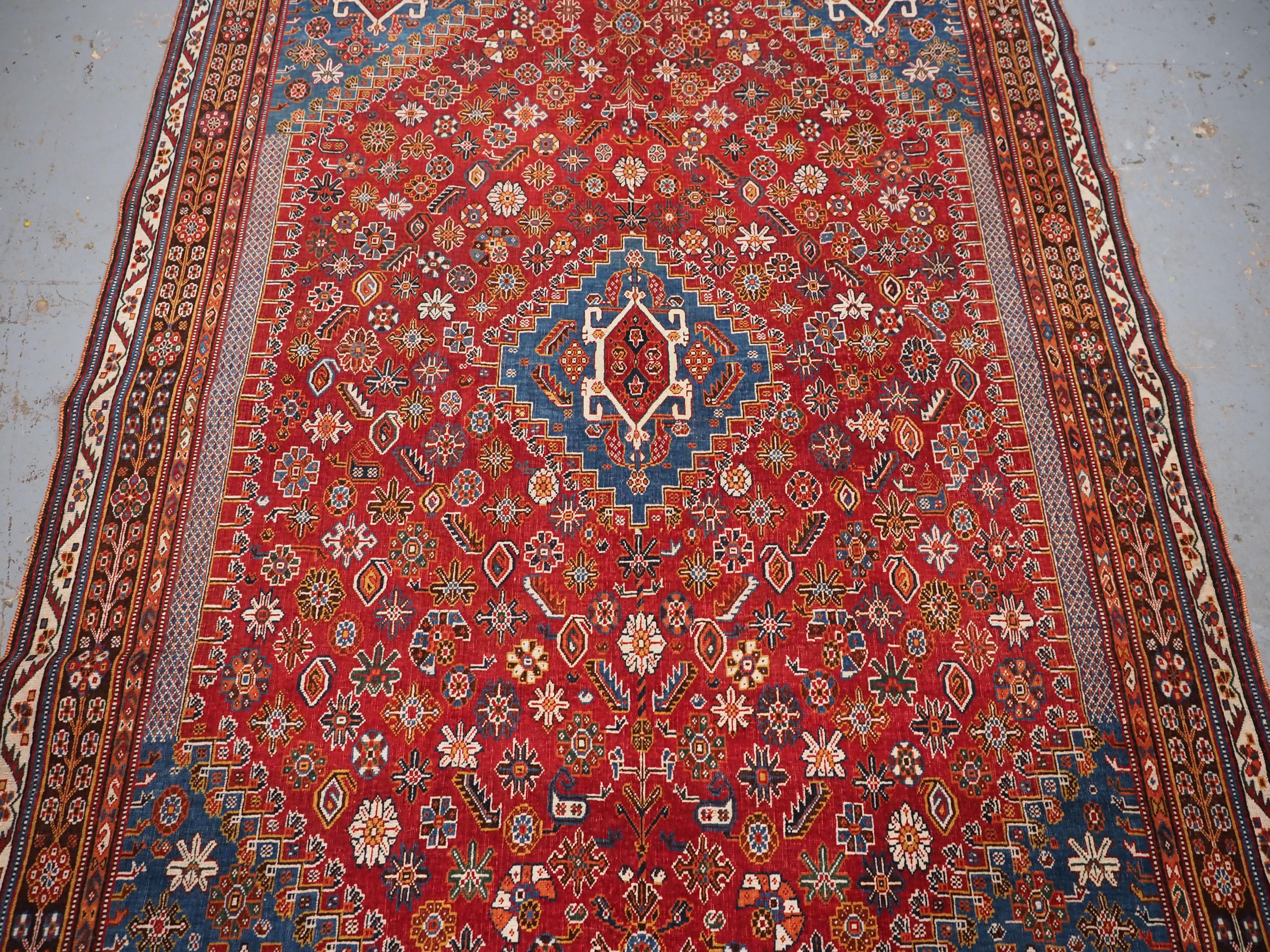 Antique Qashqai tribal rug with small central medallion.  Circa 1890. In Good Condition For Sale In Moreton-In-Marsh, GB