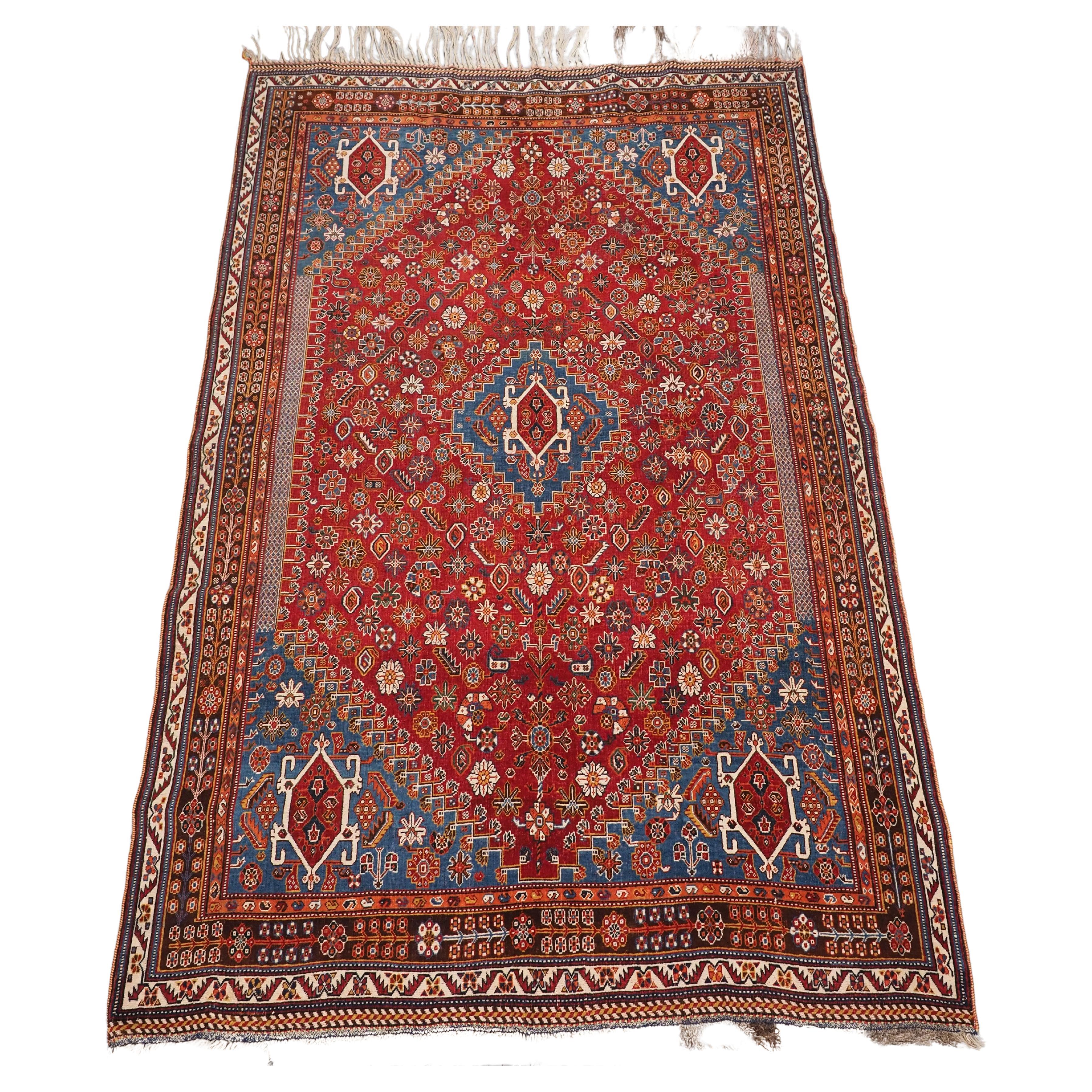 Antique Qashqai tribal rug with small central medallion.  Circa 1890. For Sale