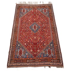 Antique Qashqai tribal rug with small central medallion.  Circa 1890.