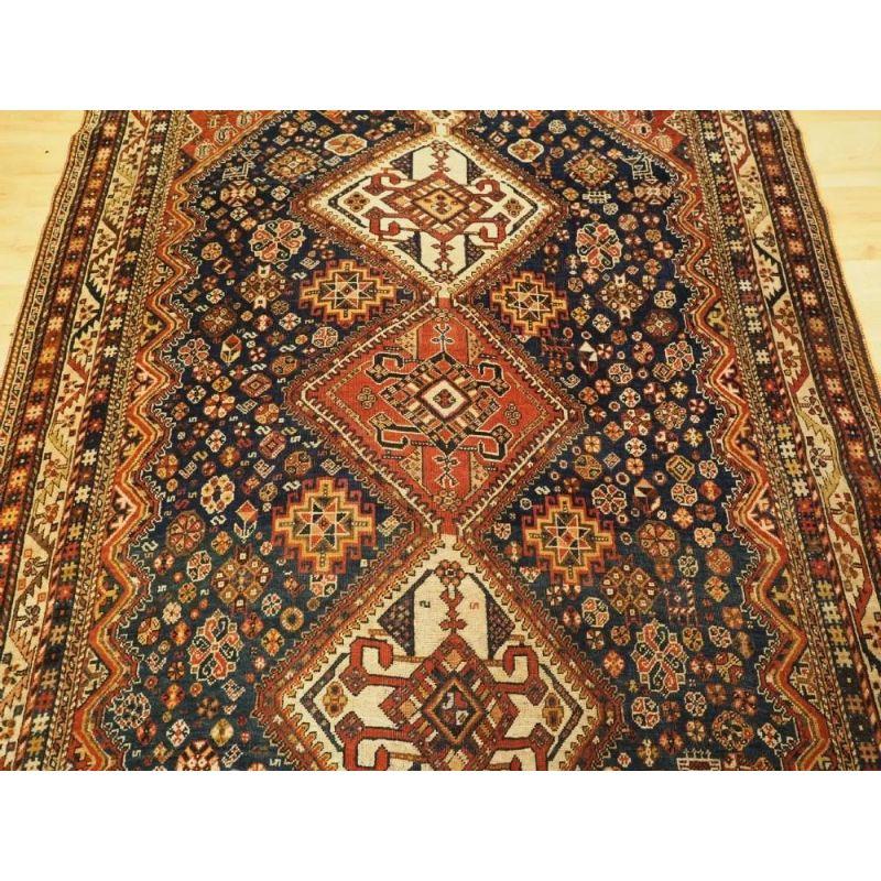 Antique Qashqai Tribal Rug with Triple Medallion Design, circa 1900 In Excellent Condition For Sale In Moreton-In-Marsh, GB