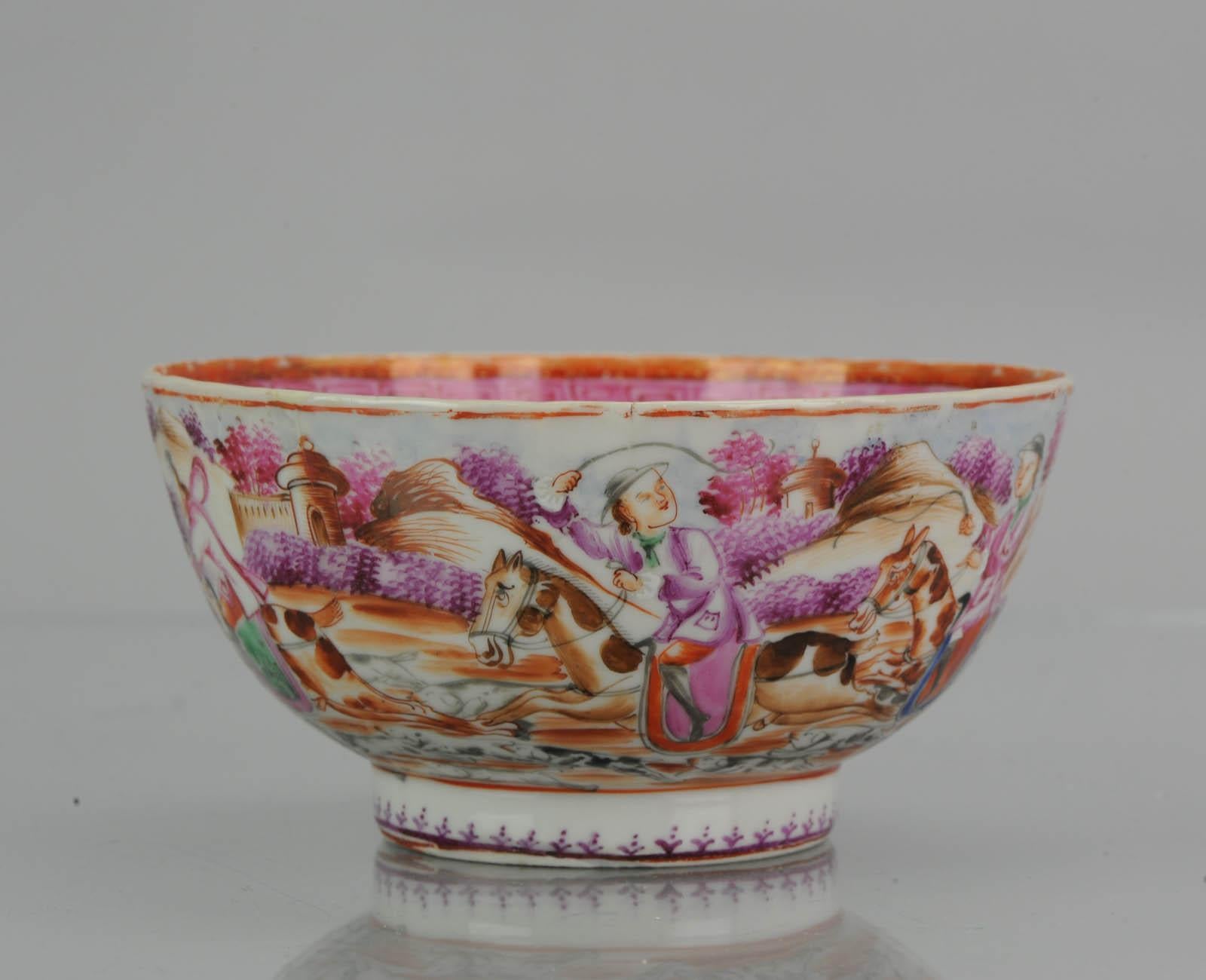 A very nicely made piece of 18th century Qianlong Mandarin Rose porcelain. With a nice hunting scene all around.

For similar examples of this type of border/decoration see:

Litzenburg, T. V. (2003). Chinese Export Porcelain in the Reeves