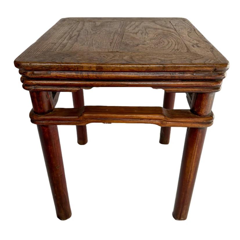 With intricate bamboo carvings and a dark wood finish, this piece from the early 20th-century Chinese late Qing Dynasty reflects a deep, rich character, showcasing the beauty of aged wood and craftsmanship of its era. Initially created in the early