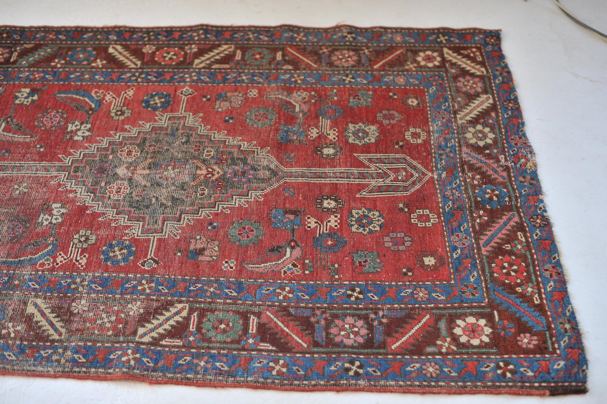 Roman Quad-Medallion Nomadic Tribal Antique Runner

About: Incredibly old and infinitely nomadic antique runner from the mountains that are known for such masterpieces! You can't ignore the rich and attractive red and the hundreds of variations of