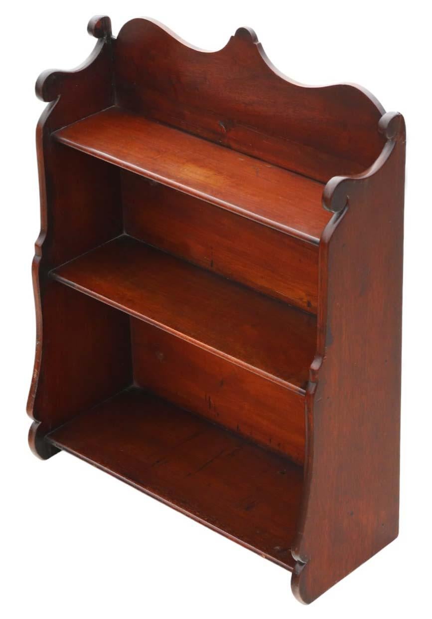 Antique, high-quality 19th-century mahogany bookcase shelves designed for floor or wall hanging.

This piece is solid and sturdy, with no loose joints or woodworm. A delightful and rare quality discovery.

Certain to add character to the right