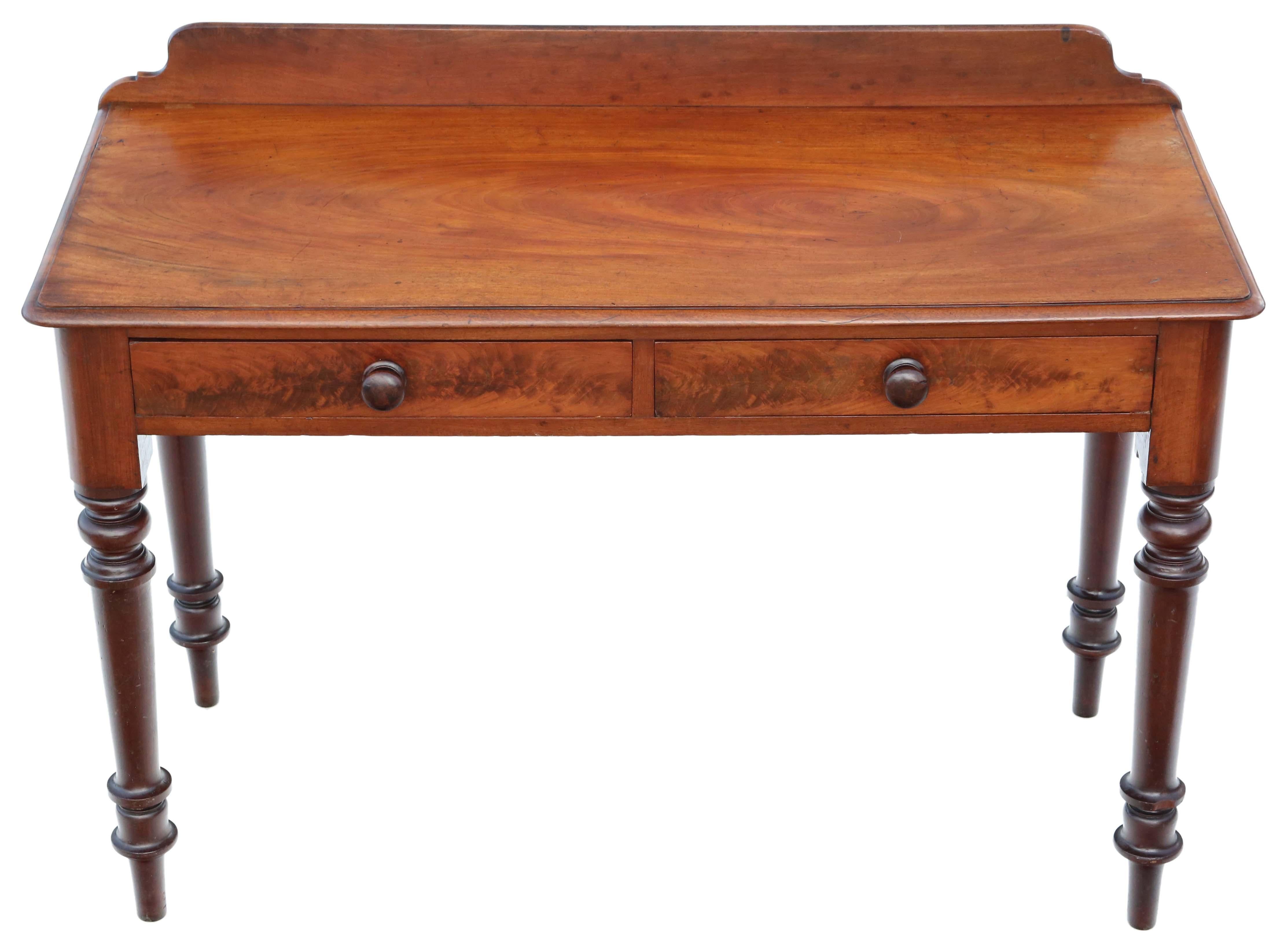Antique quality 19th Century mahogany writing side dressing table desk. Lovely age colour and patina.

No loose joints and no woodworm. Full of age, character and charm. The mahogany lined drawers slide freely.

Would look great in the right