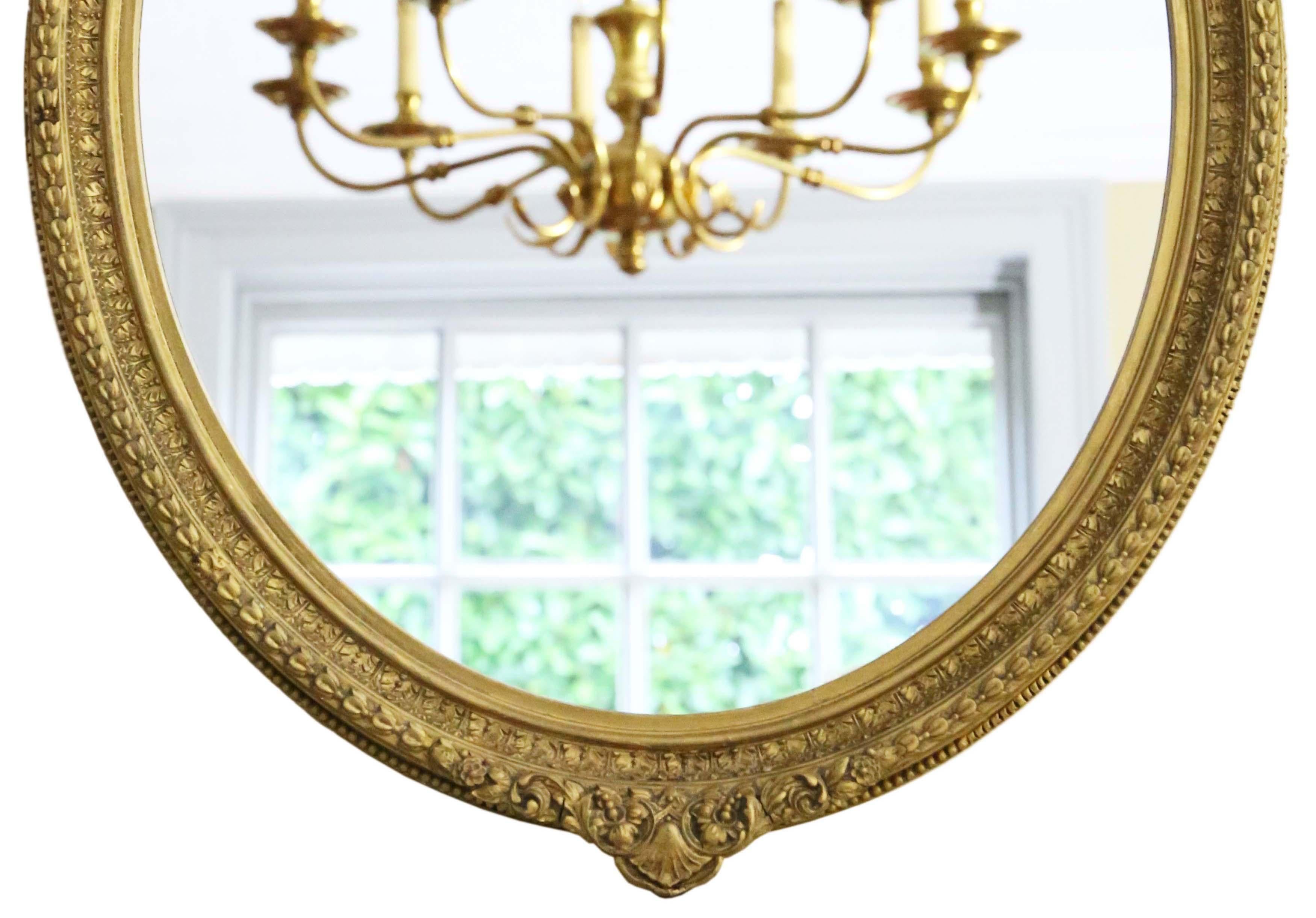 Glass Antique quality 19th Century oval gilt overmantle wall mirror For Sale