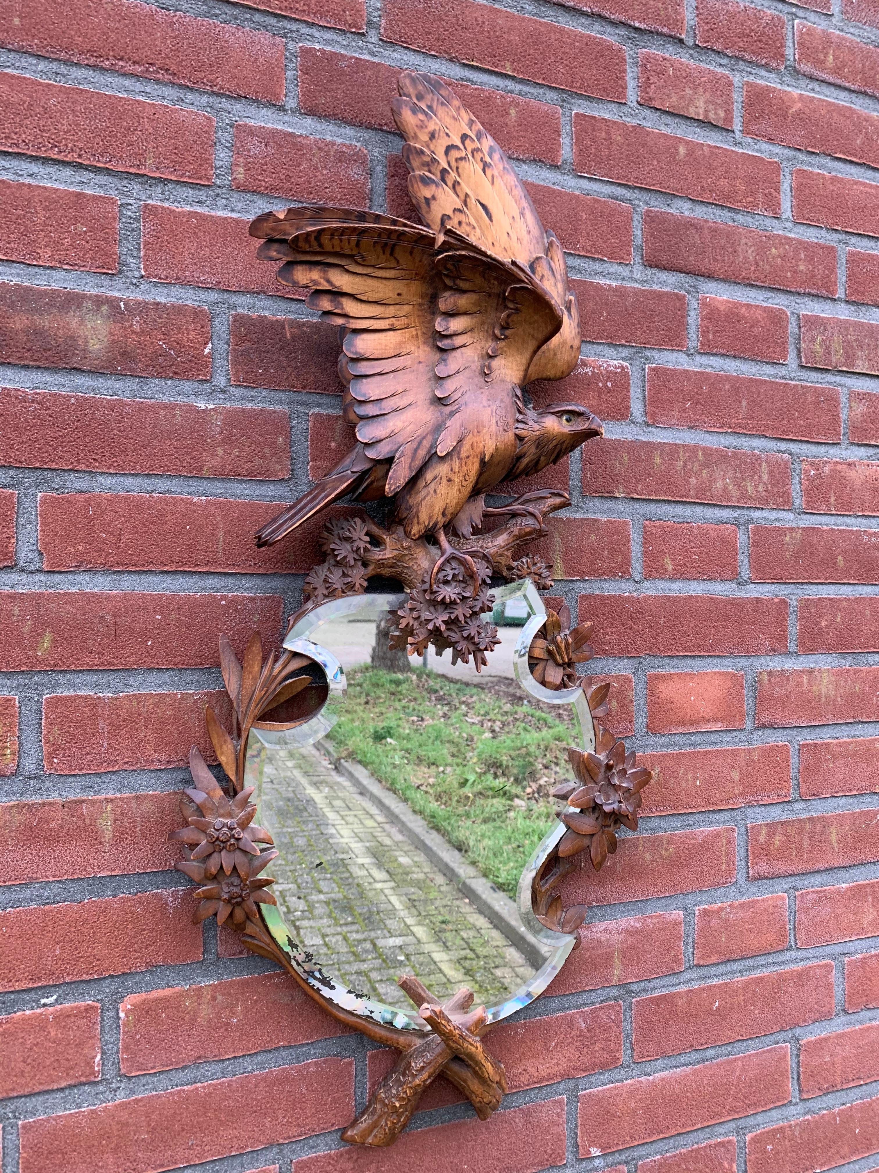 Rare, beautifully carved and highly decorative wall mirror.

If you are appreciative of rare and sculptural antiques then this Swiss BF mirror could be exactly what you are looking for. The quality and the patina of this eagle sculpture and frame