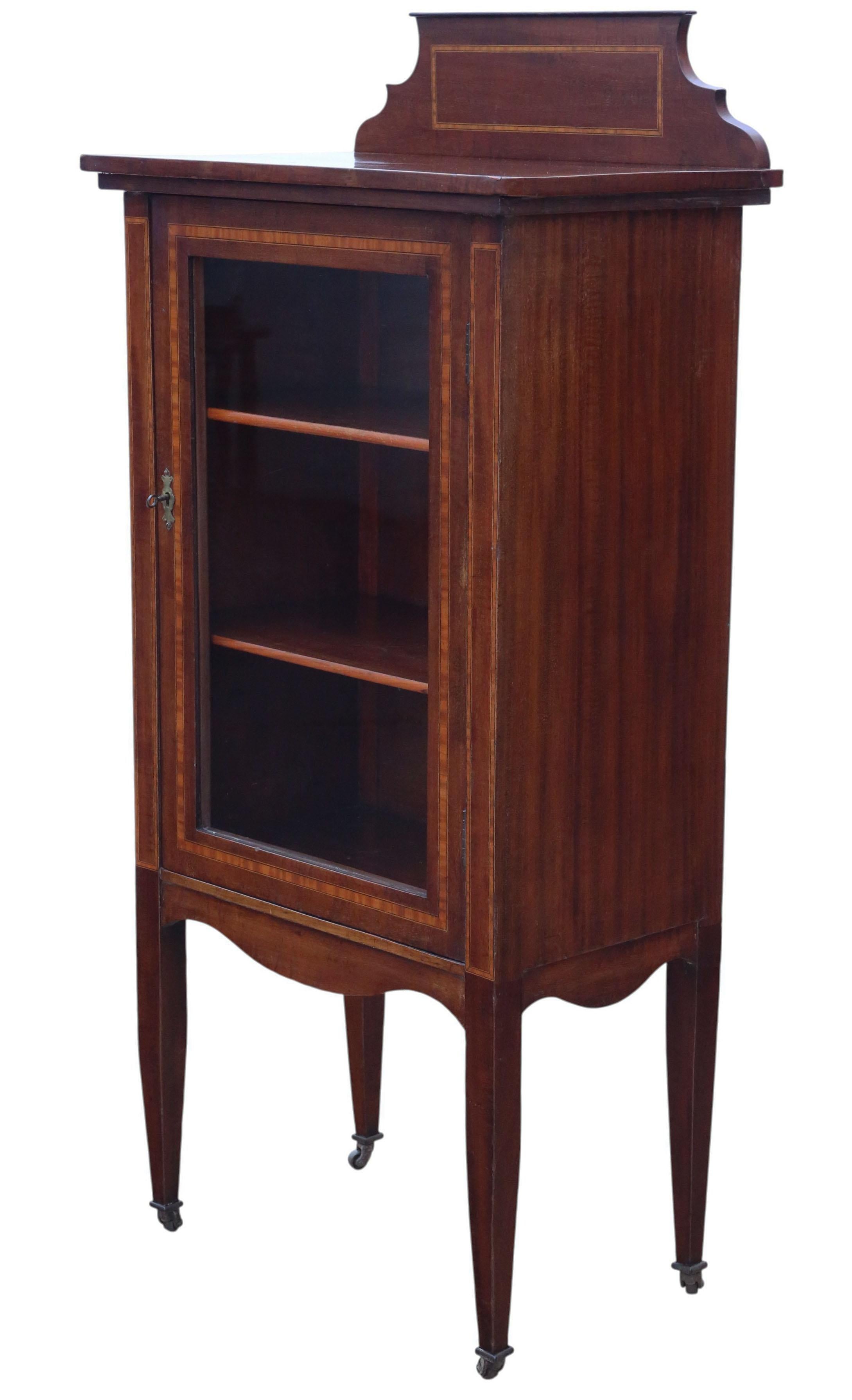 Antique Quality Edwardian c.1910 Inlaid Mahogany Display Cabinet / Bookcase

An early 20th-century Edwardian mahogany display cabinet with attractive age, colour, and patina. Full of authentic charm and character, this rare decorative find features