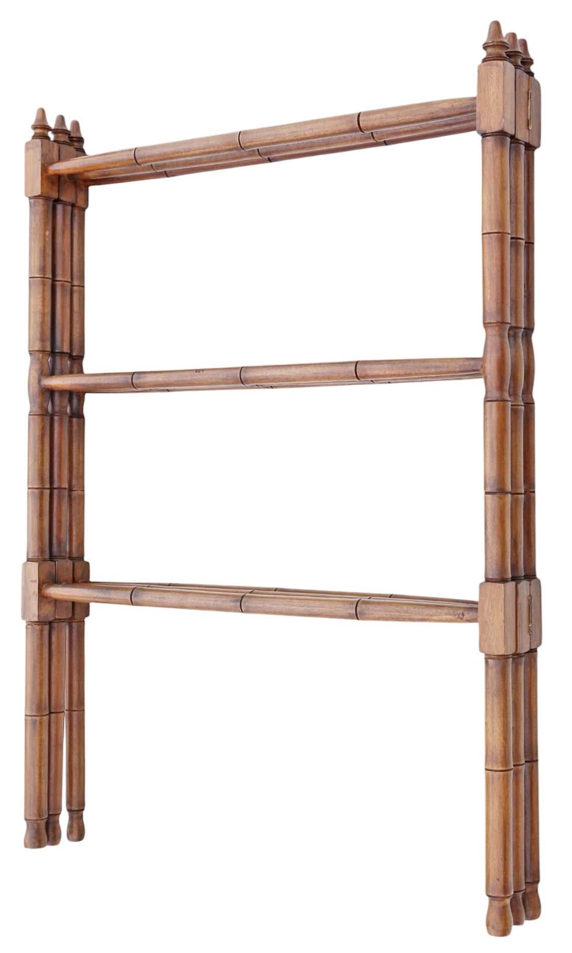 Antique Quality Faux Bamboo Towel Rail Clothes Horse Stand c.1900

This charming c.1900 faux bamboo towel rail or clothes horse stand is a solid and sturdy piece with no loose joints and no signs of woodworm. Its timeless design makes it a perfect