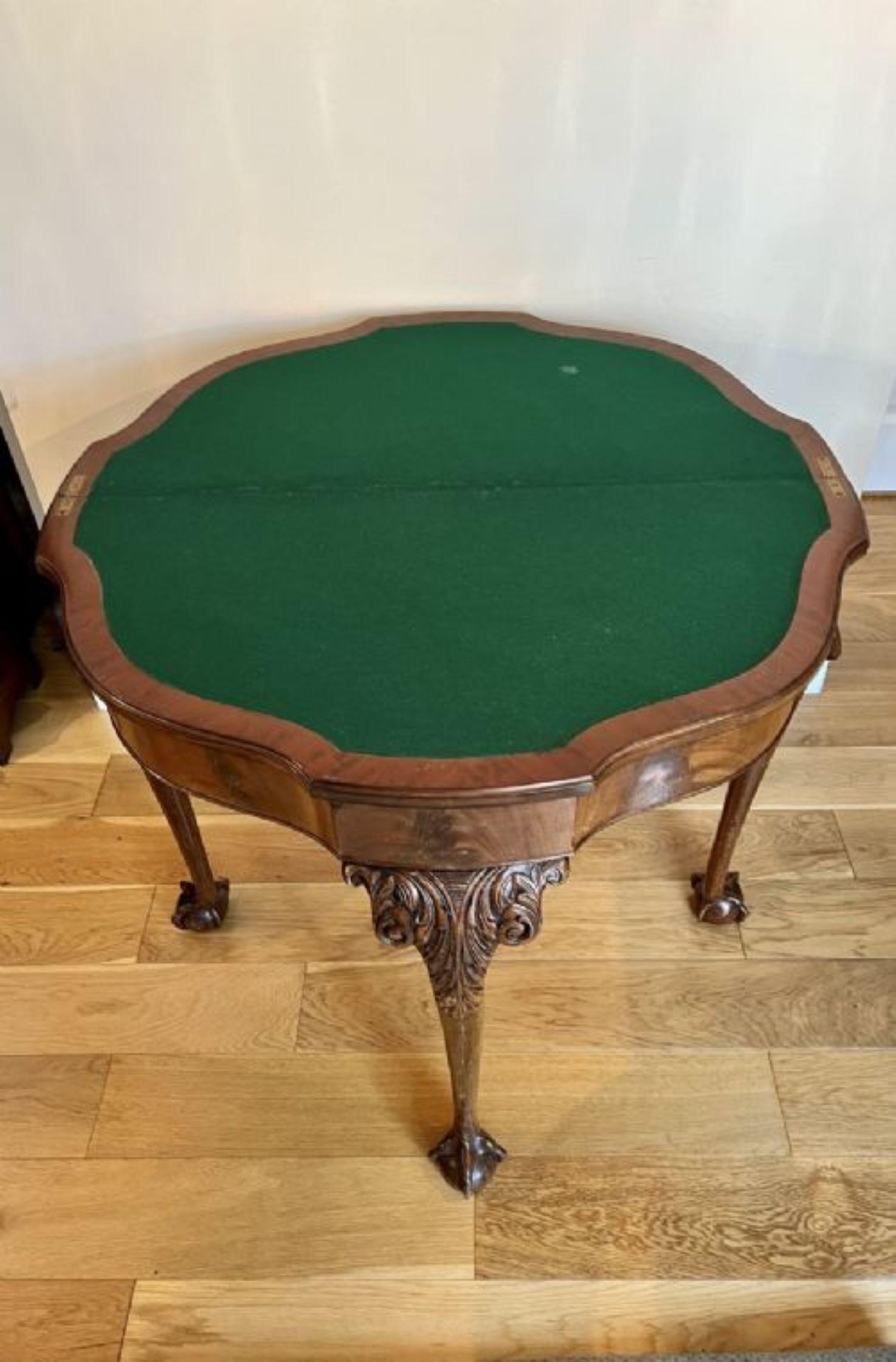 Antique Quality figured walnut card table (maple & co) having a quality serpentine shaped figured walnut top with a superb carved edge opening to reveal a baize interior. Figured walnut frieze standing on fantastic carved cabriole legs with claw and