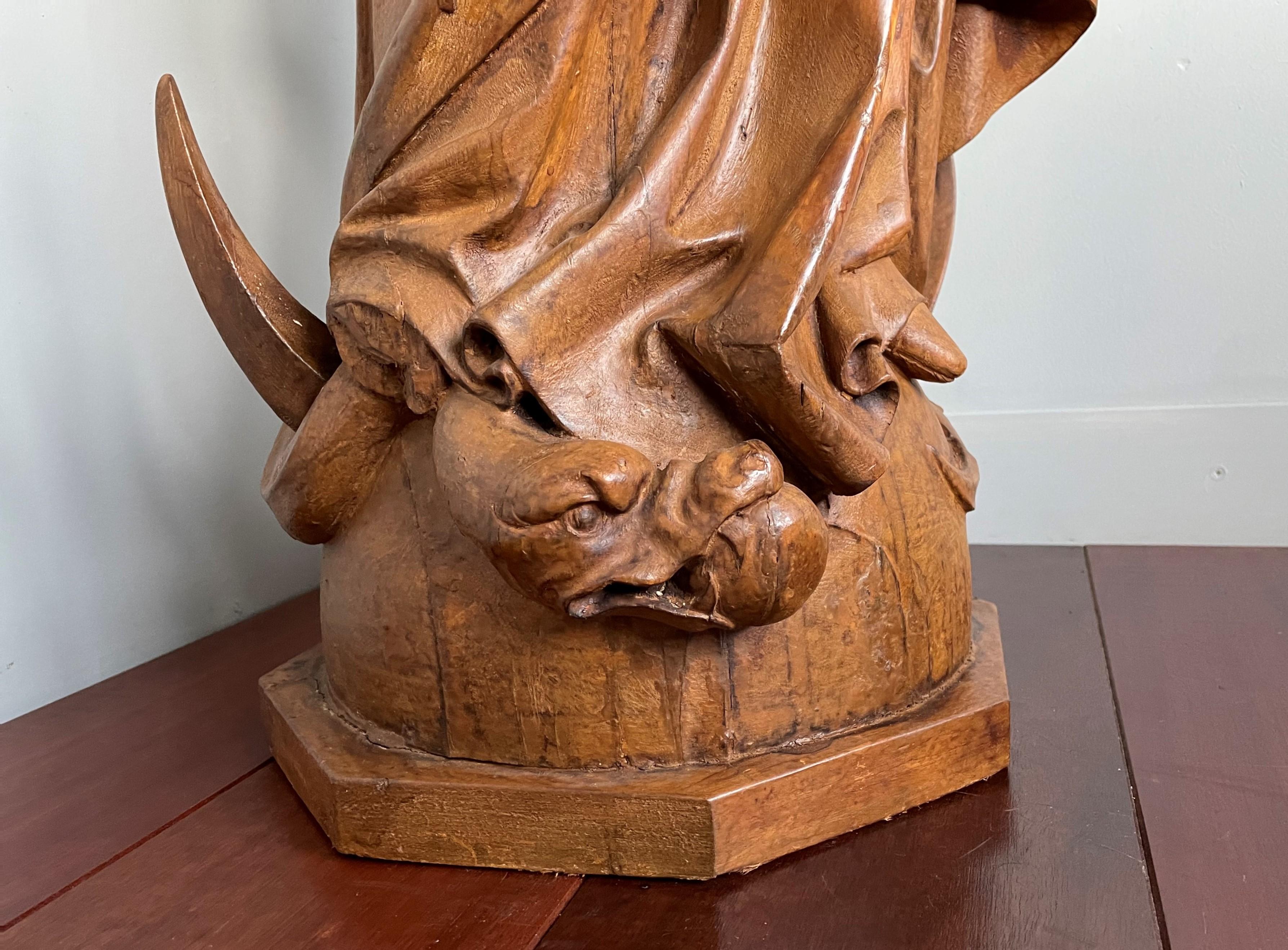 Antique Quality Hand Carved Life-Size Statue of Mother Mary Crushing The Serpent In Good Condition In Lisse, NL