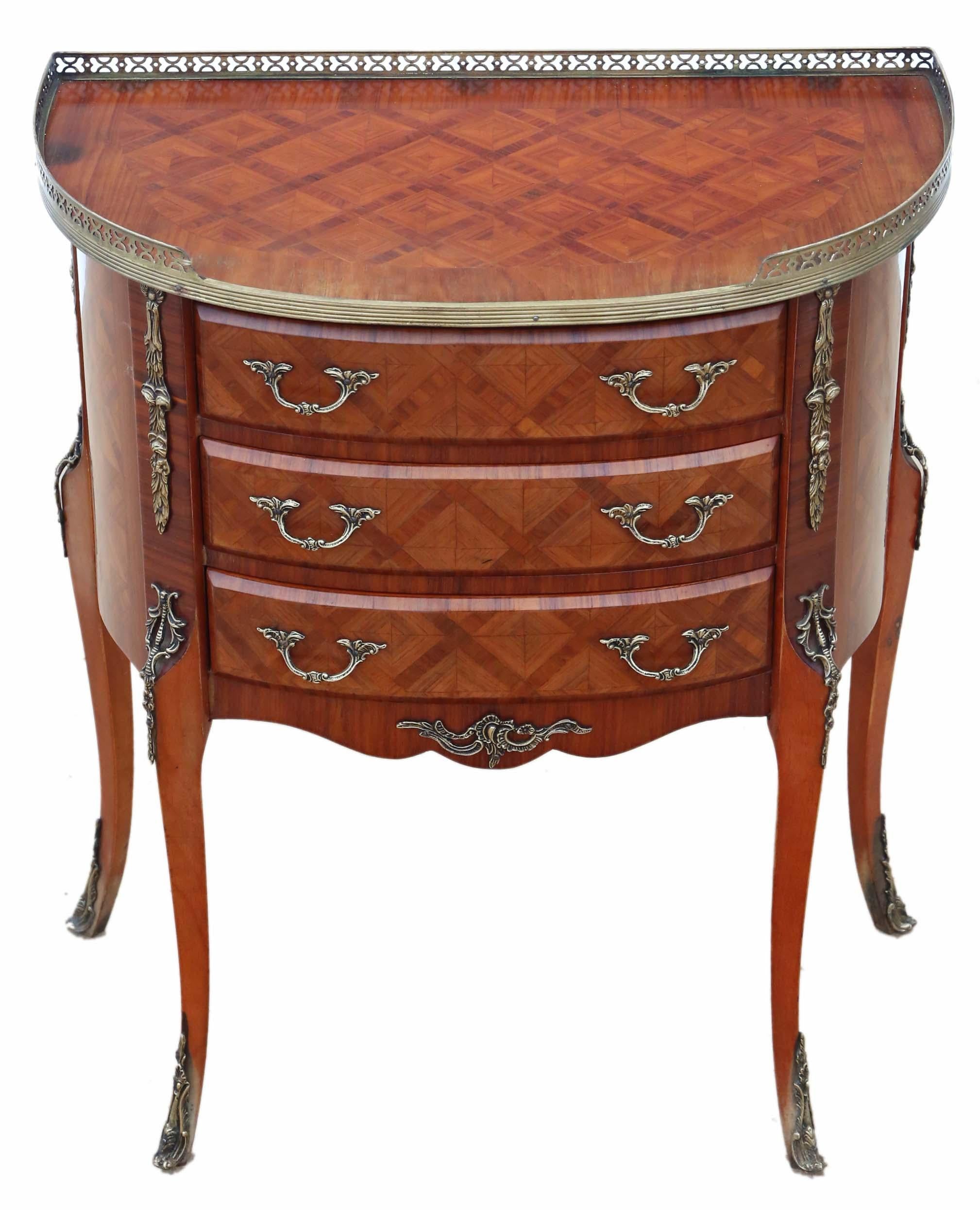 Antique quality large French inlaid parquetry bedside table or cupboard.

No loose joints and no woodworm. Full of age, character and charm. Attractive demilune shape, parquetry inlays, brass ormolu mounts and gallery. The mahogany lined drawers