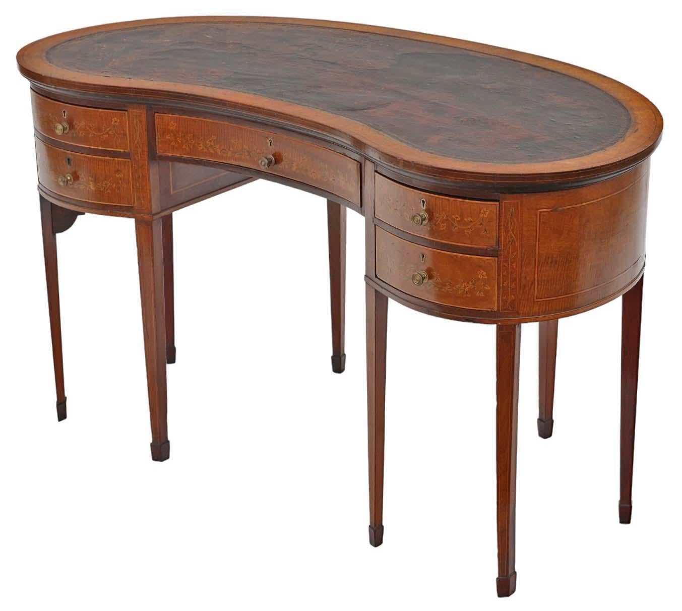 Antique, high-quality large circa 1900 inlaid mahogany kidney-shaped JAS Shoolbred twin pedestal desk, suitable for use as a dressing or writing table. It boasts a delightful age, color, and patina.

This piece is solidly constructed, with no loose