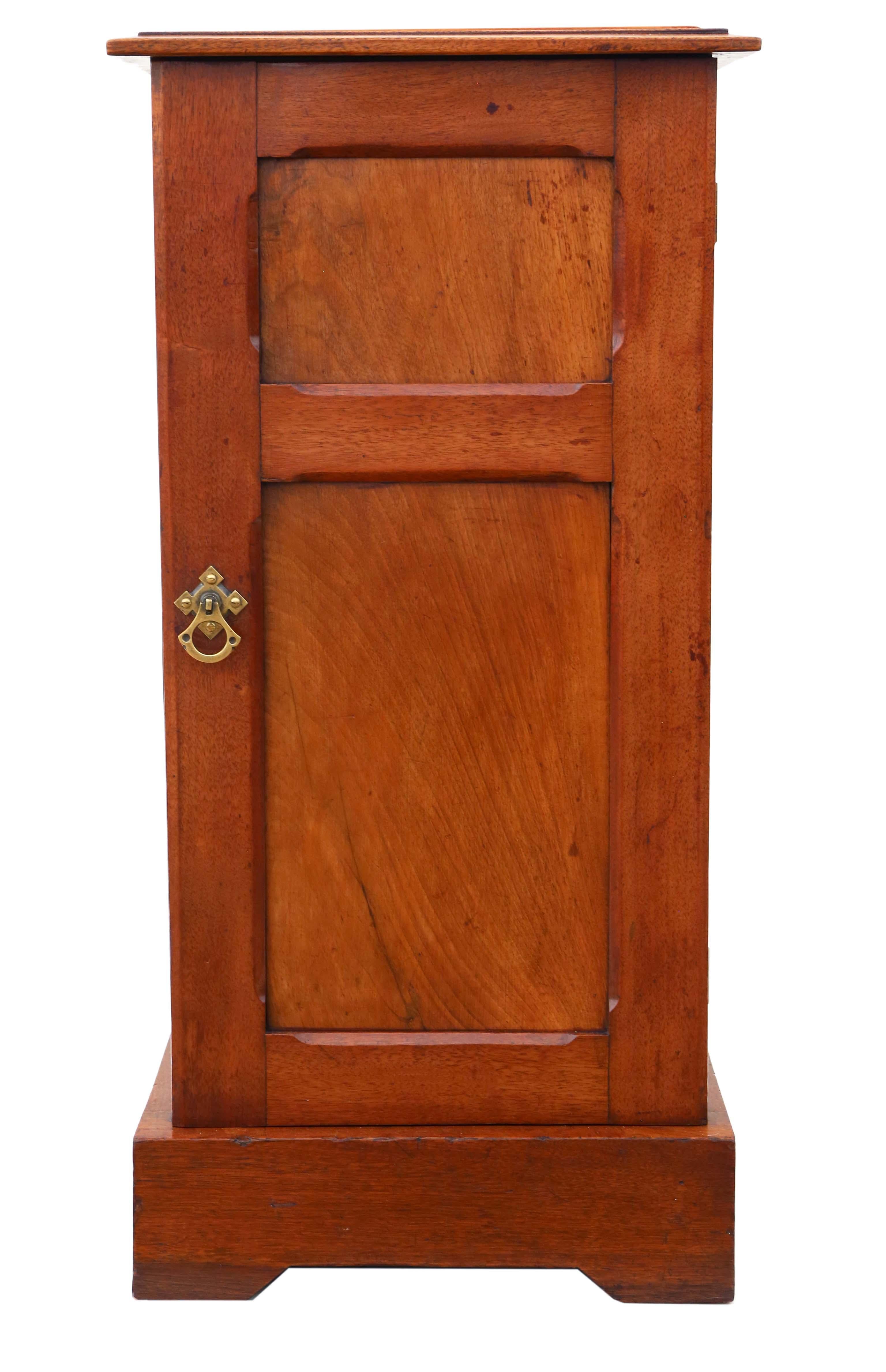 Antique quality Arts and Crafts late 19th Century mahogany nightstand, cupboard or bedside table.

Great item, which is solid and heavy with no loose joints. Attractive two panelled door with a brass handle and a later working catch.

Lovely age,