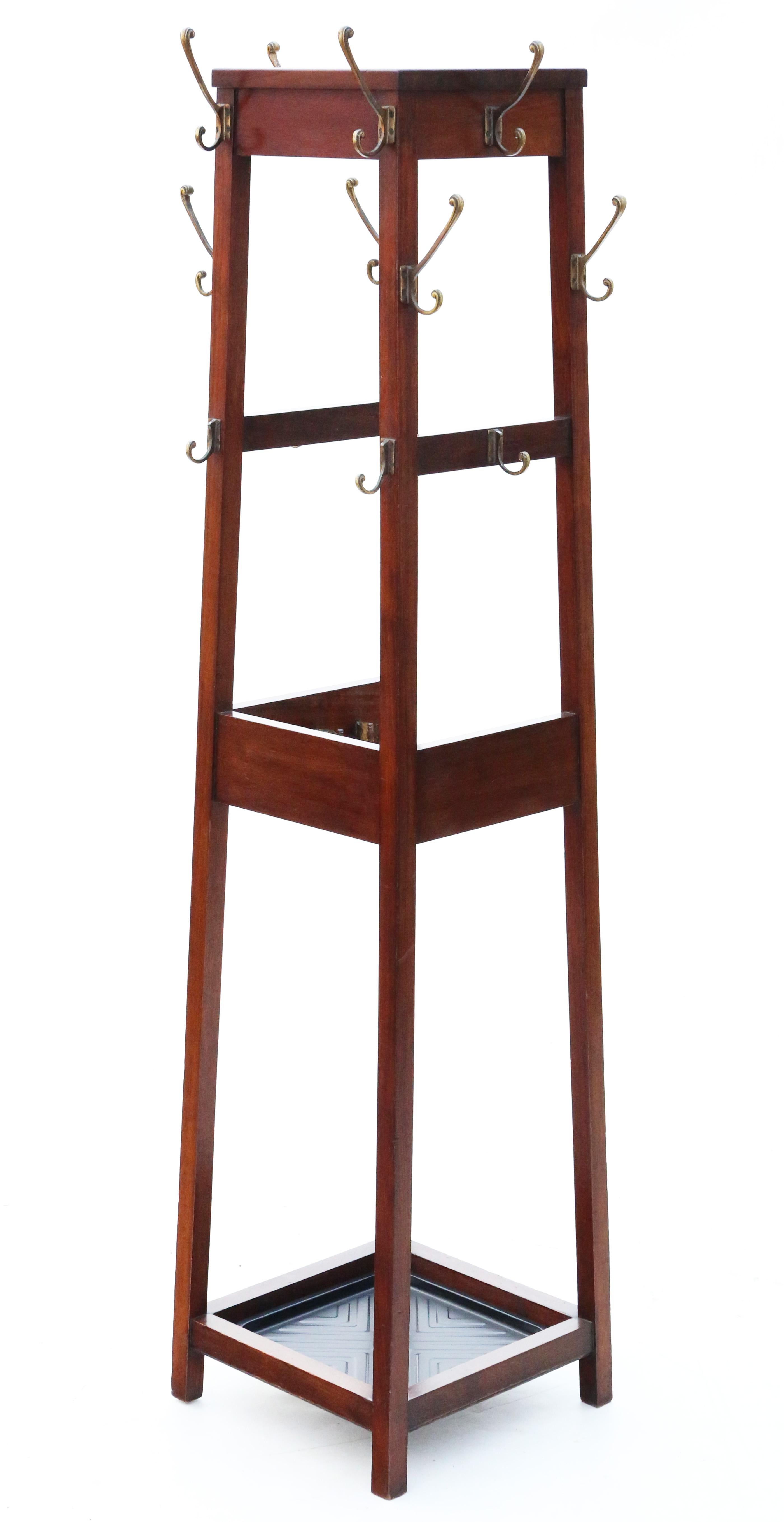 Antique quality mahogany coat hat stick umbrella stand C1920.

Solid and heavy, with no loose joints. A rare find.

Overall maximum dimensions:

41cm square base and 31cm square top (47cm x 37cm including hooks) x 168cm (171cm including hangers)