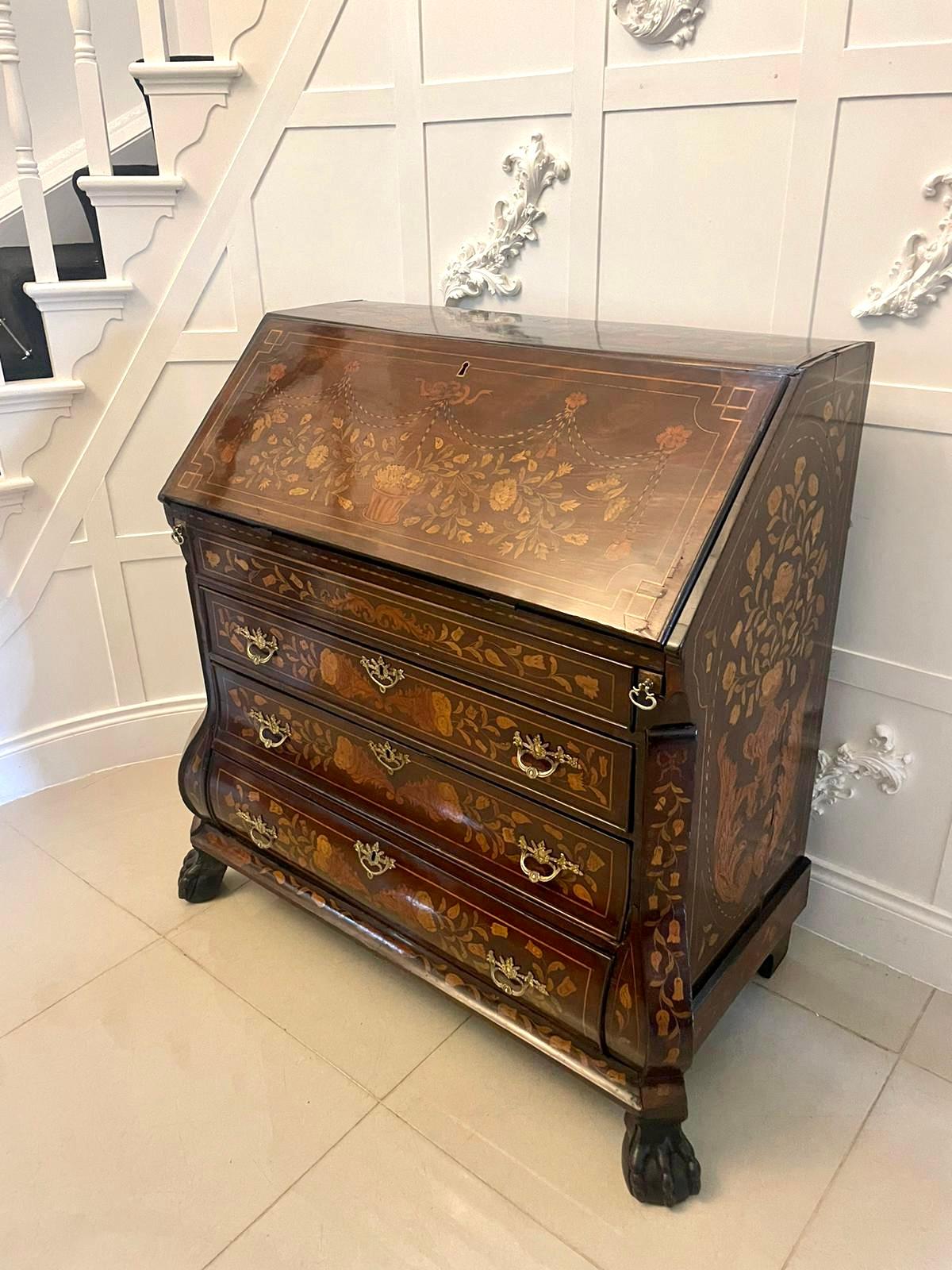 Antique 18th century quality mahogany floral marquetry inlaid bombe shaped bureau 
having a quality floral marquetry fall opening to reveal a fitted interior consisting of drawers, pigeon holes, door and a well above three bombe shaped floral
