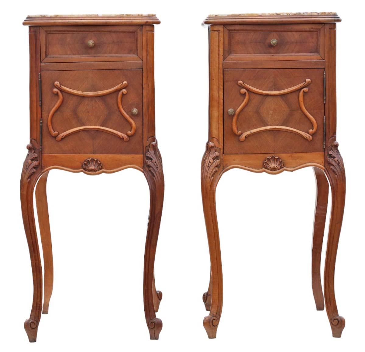 Antique, high-quality pair of French walnut (or possibly cherry) bedside tables/cupboards dating from circa 1920. Featuring loose-laid marble tops, as is customary for this style.

These pieces are sturdy and robust, with no loose joints or signs of