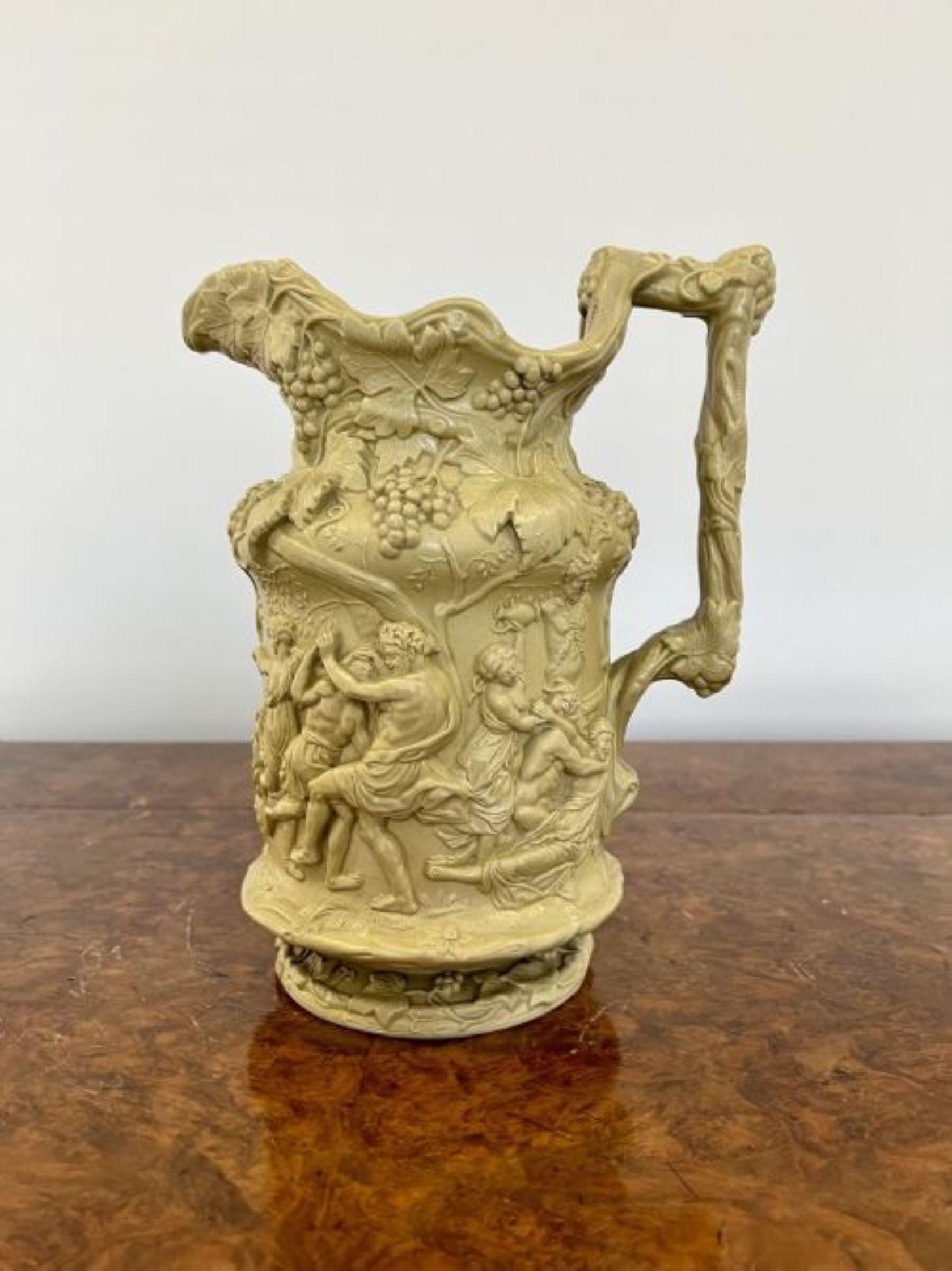 Antique quality relief moulded jug, having a quality relief moulded jug in the Bacchanalian dance 

D. 1844