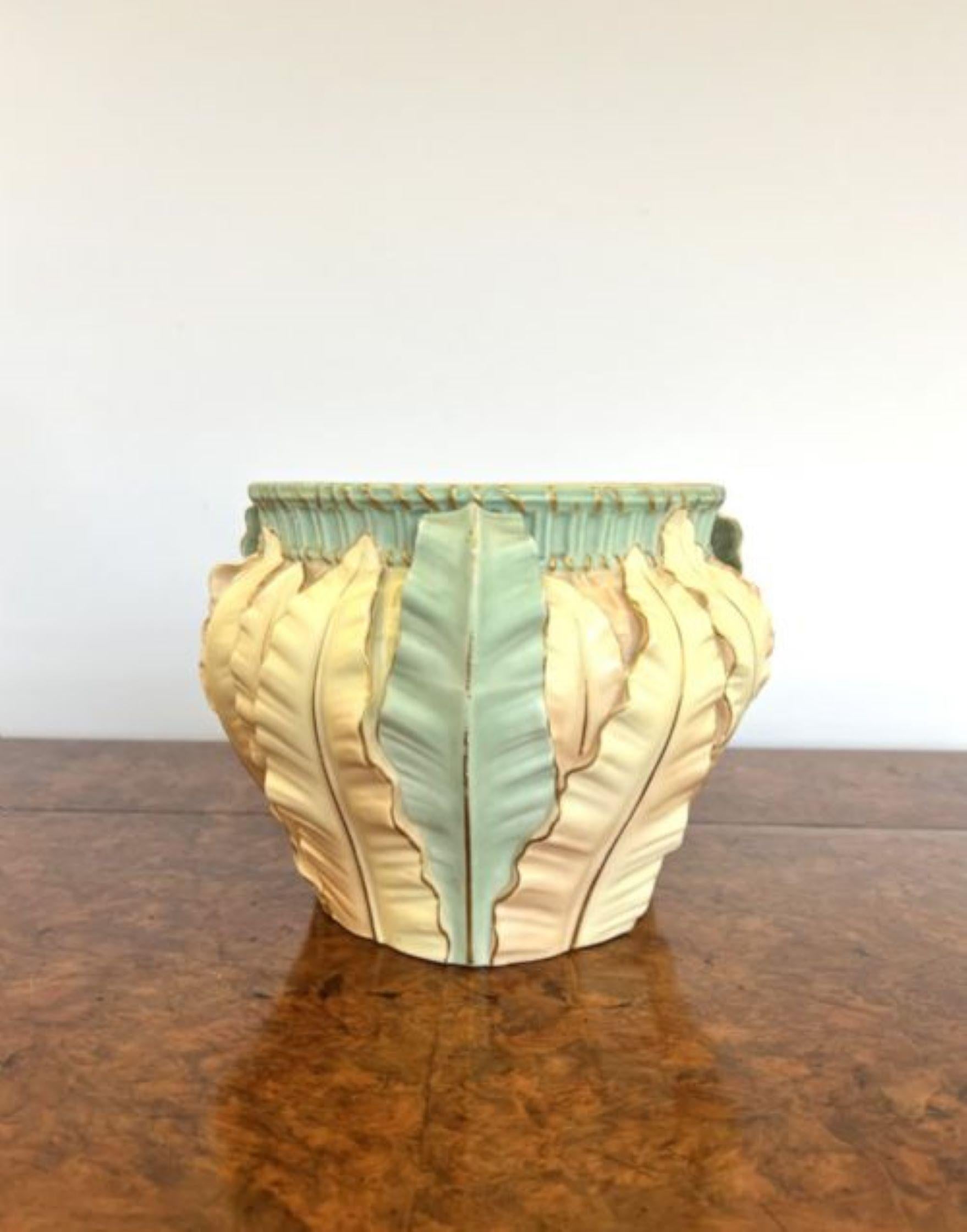 Antique quality Royal Worcester blush ivory jardiniere having a quality antique Royal Worcester blush ivory jardiniere with wonderful leaf decoration in stunning pastel colours in yellow, green, orange and gold having three green leaf shaped handles