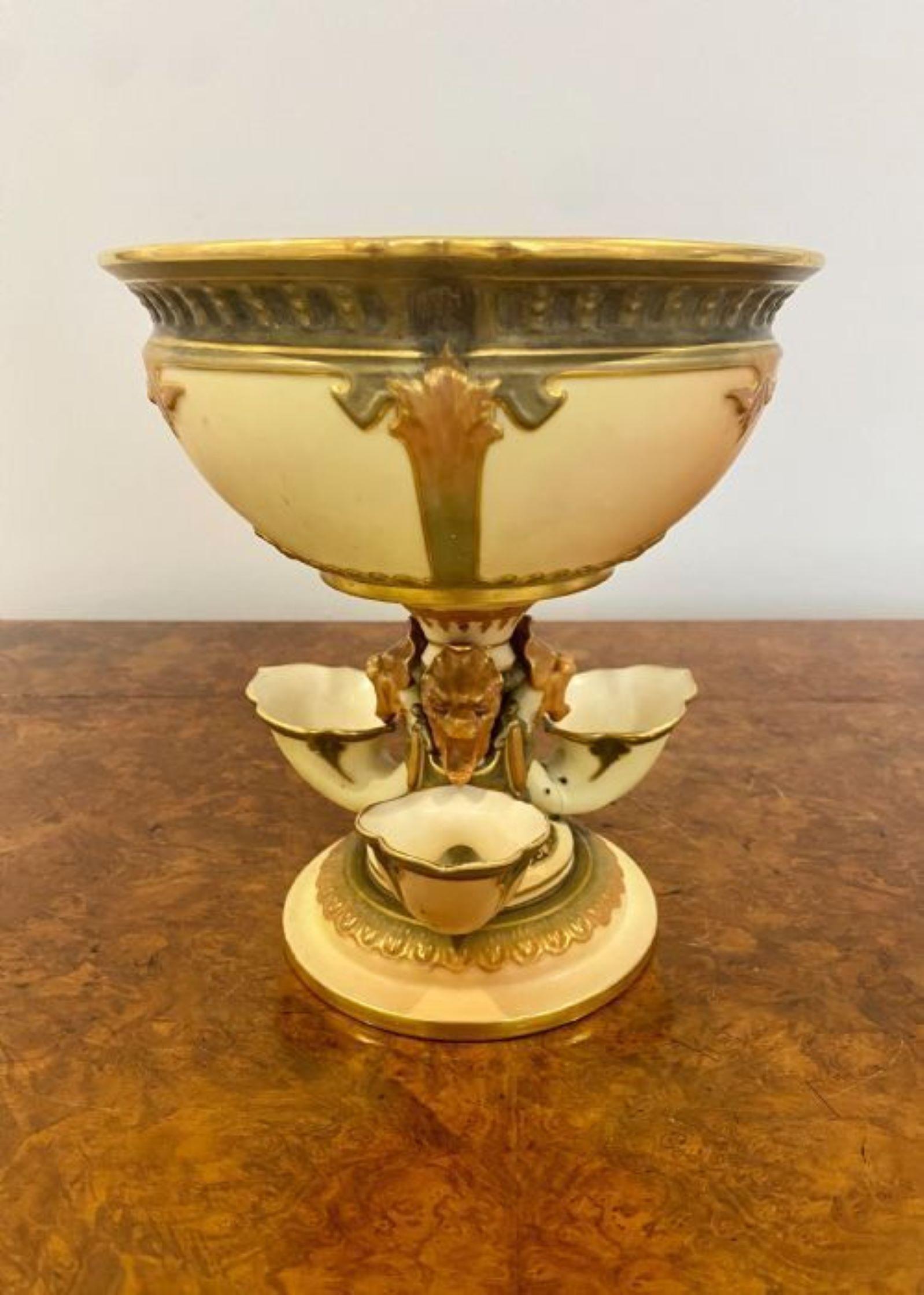 Antique quality Royal Worcester centerpiece having a bowl raised on a central support decorated with lions masks and issuing three further bowls decorated in  wonderful blush ivory, green and gold colours on a circular base