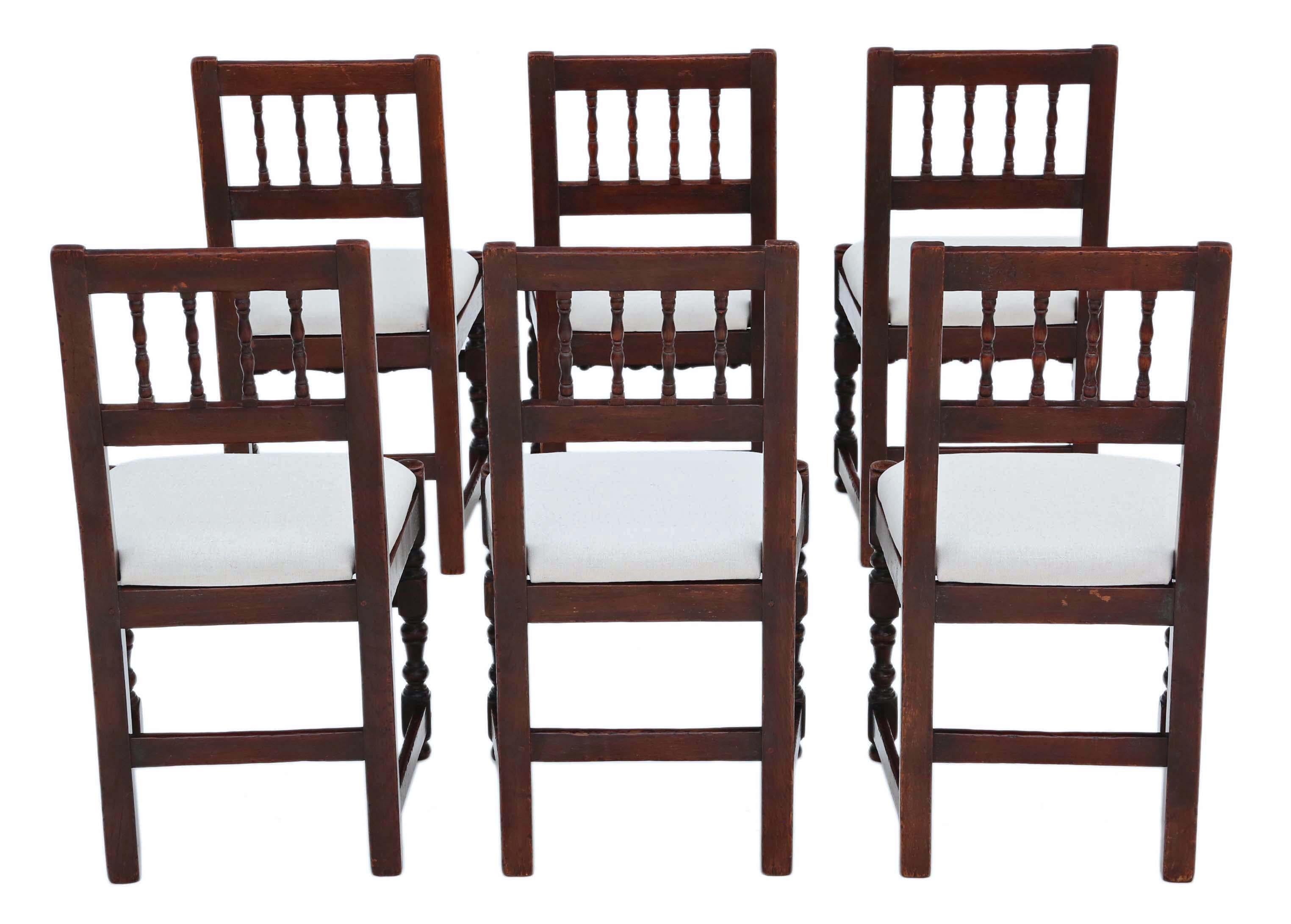 Antique quality set of 6 19th Century rustic oak kitchen or dining chairs.

No loose joints or woodworm.

New professional upholstery. 

Overall maximum dimensions: 48cmW x 48cmD x 93cmH (48cmH seat when sat on)

Good antique condition with minor