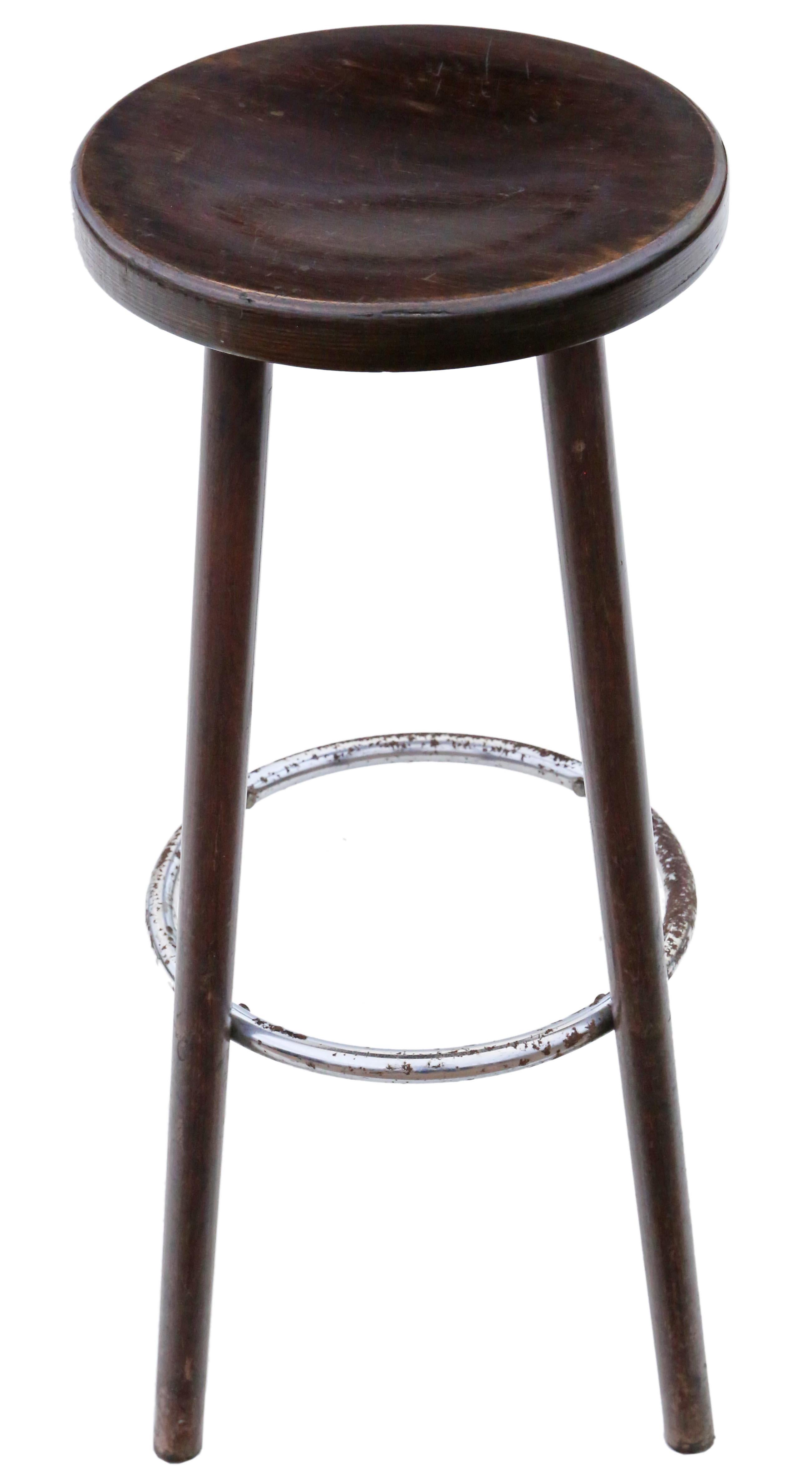 Antique quality set of 8 French bistro bar stools, circa 1960.

Solid and strong with no loose joints or woodworm.

Overall maximum dimensions: 35cm diameter seat 48cm diameter feet x 80cm high.

Very good antique condition with historic