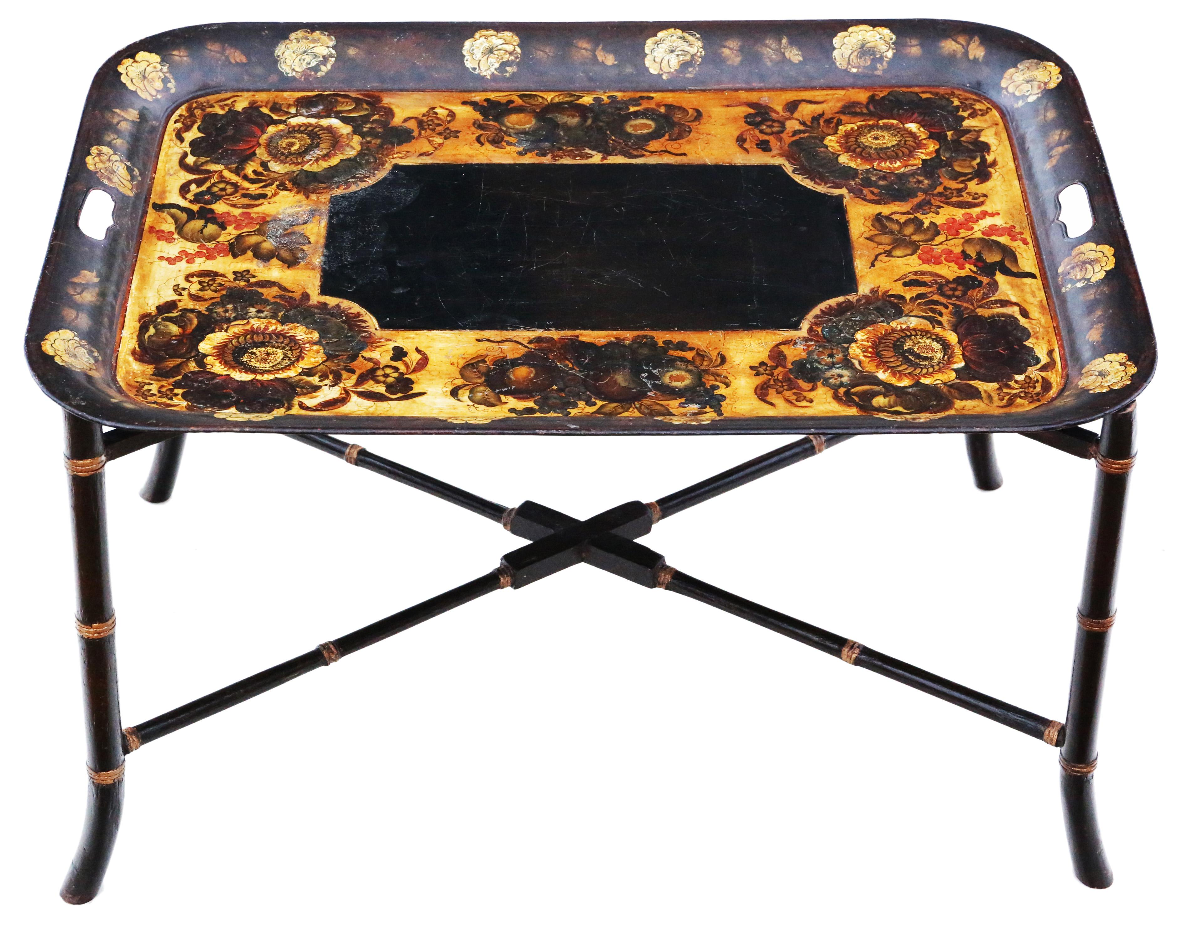 Antique quality Victorian 19th Century decorated black lacquer coffee table tray on stand.
 
Would make a great coffee table. No loose joints.
Quality metal tray.

Very attractive, with lovely proportions and styling. No woodworm.

Lovely age colour
