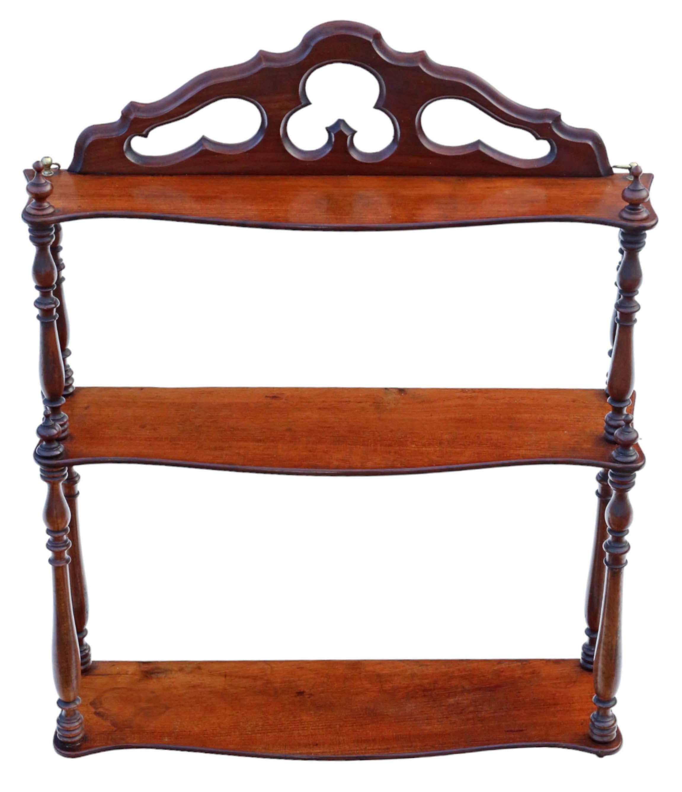 Antique Victorian Gothic 19th Century mahogany bookcase wall shelves of exceptional quality.

This piece is replete with age, charm, and character, offering a solid structure with no loose joints and no woodworm.

Its presence would be striking in
