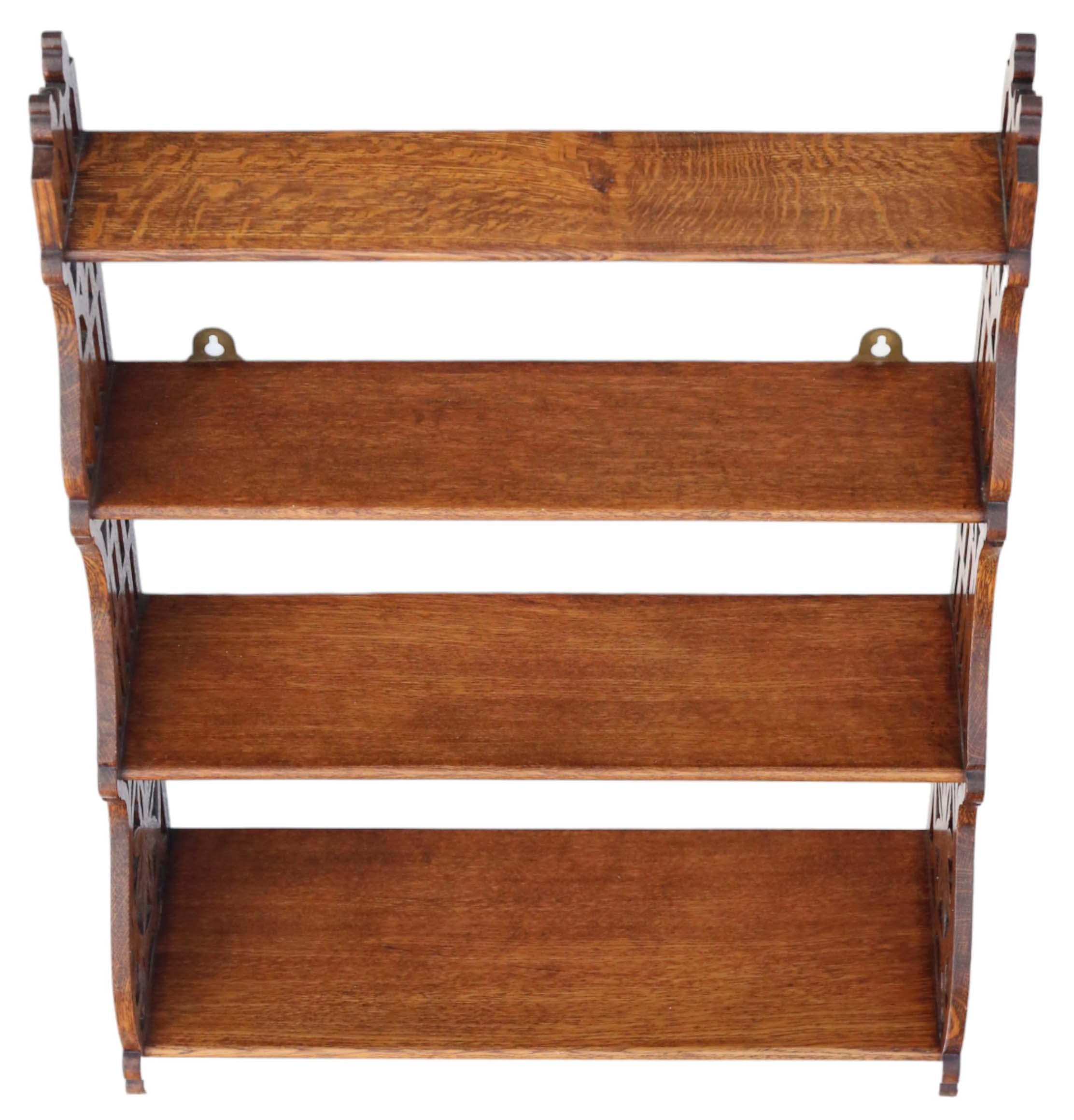 Early 20th Century Antique quality Victorian Gothic C1900 fret cut oak bookcase wall shelves. For Sale