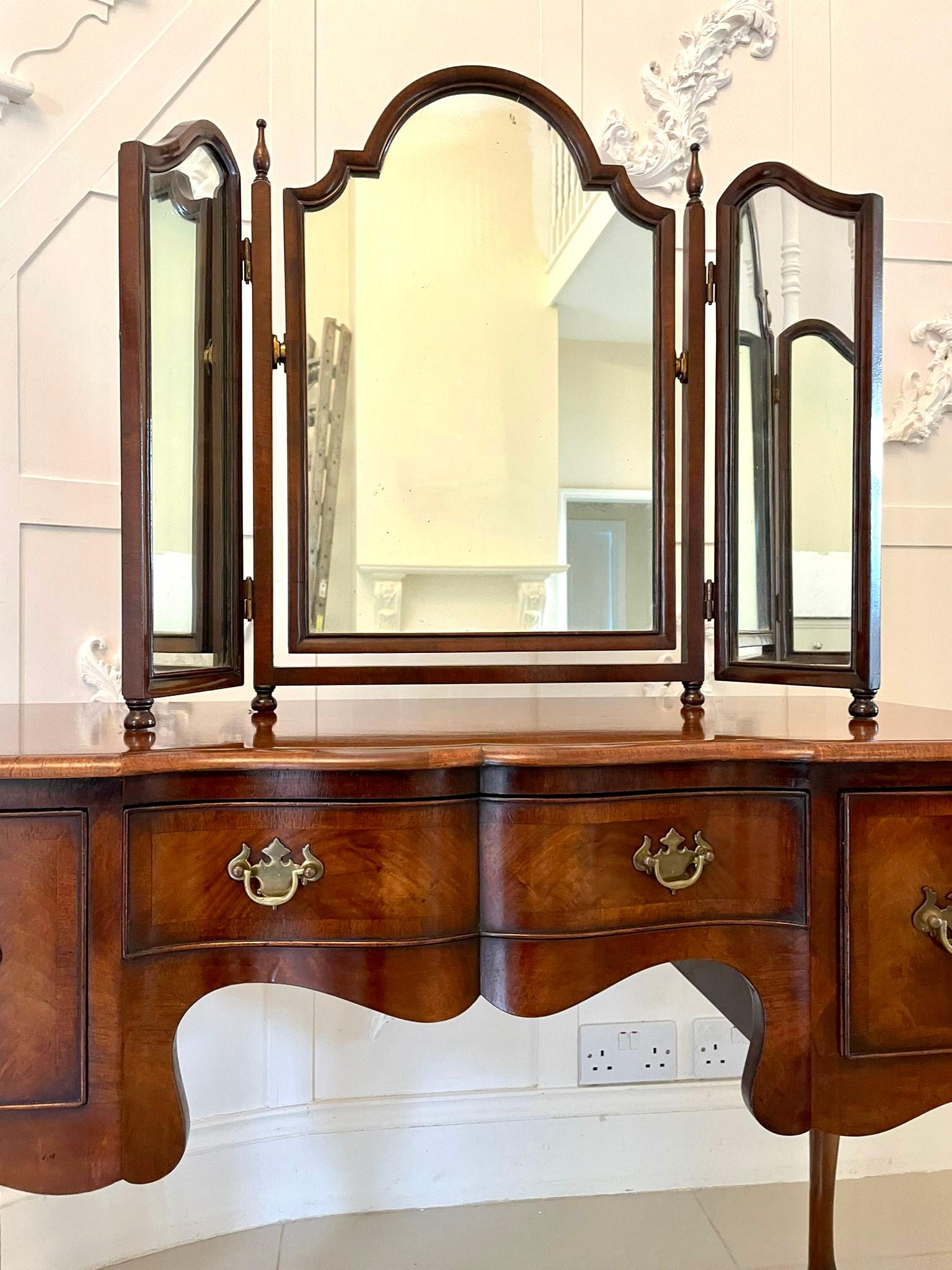 Antique quality walnut shaped top triple mirror having a quality walnut triple framed adjustable dressing mirror with original mirrors and turned walnut finals raised on bun feet.

A charming example in lovely original condition.
 
H 61cm
W 84cm
D