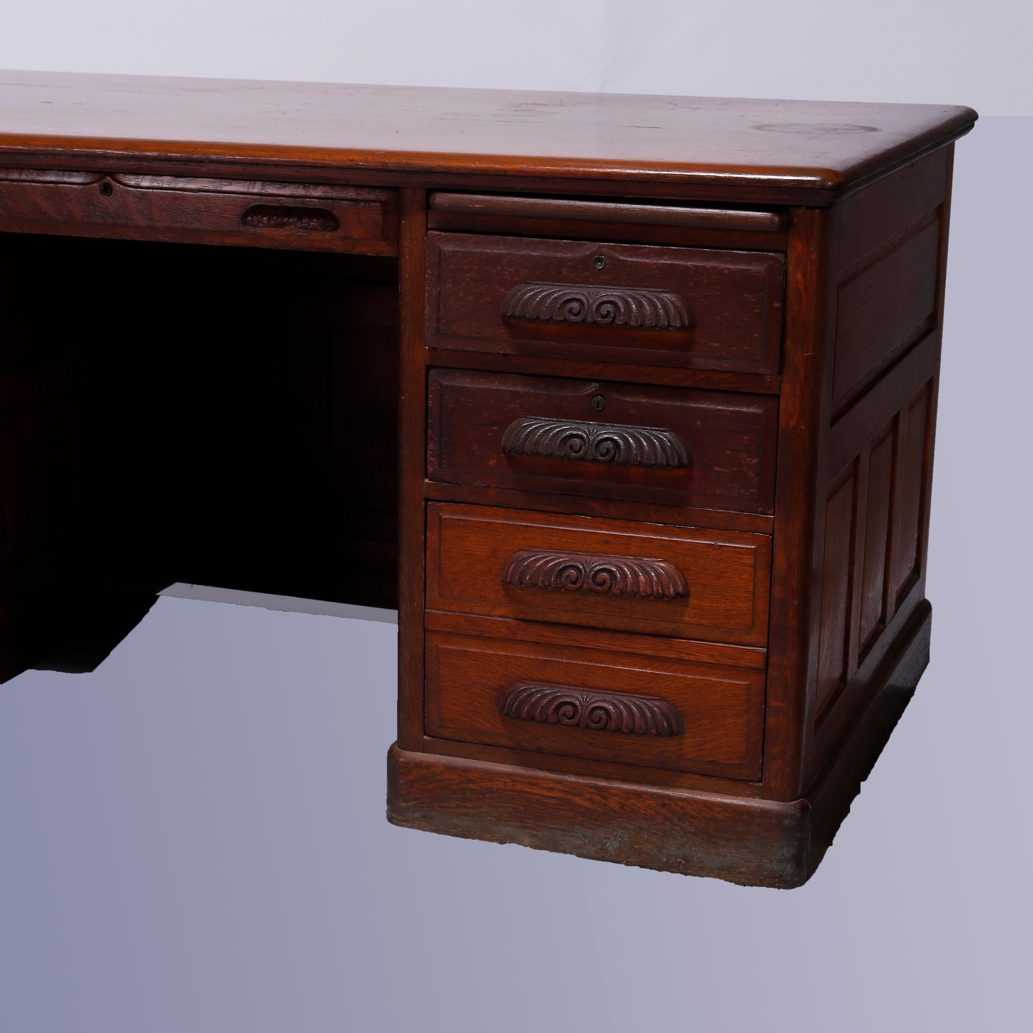 American Antique Quarter Sawn Oak Knee Hole Desk with Raised Panels & Carved Pulls C1900