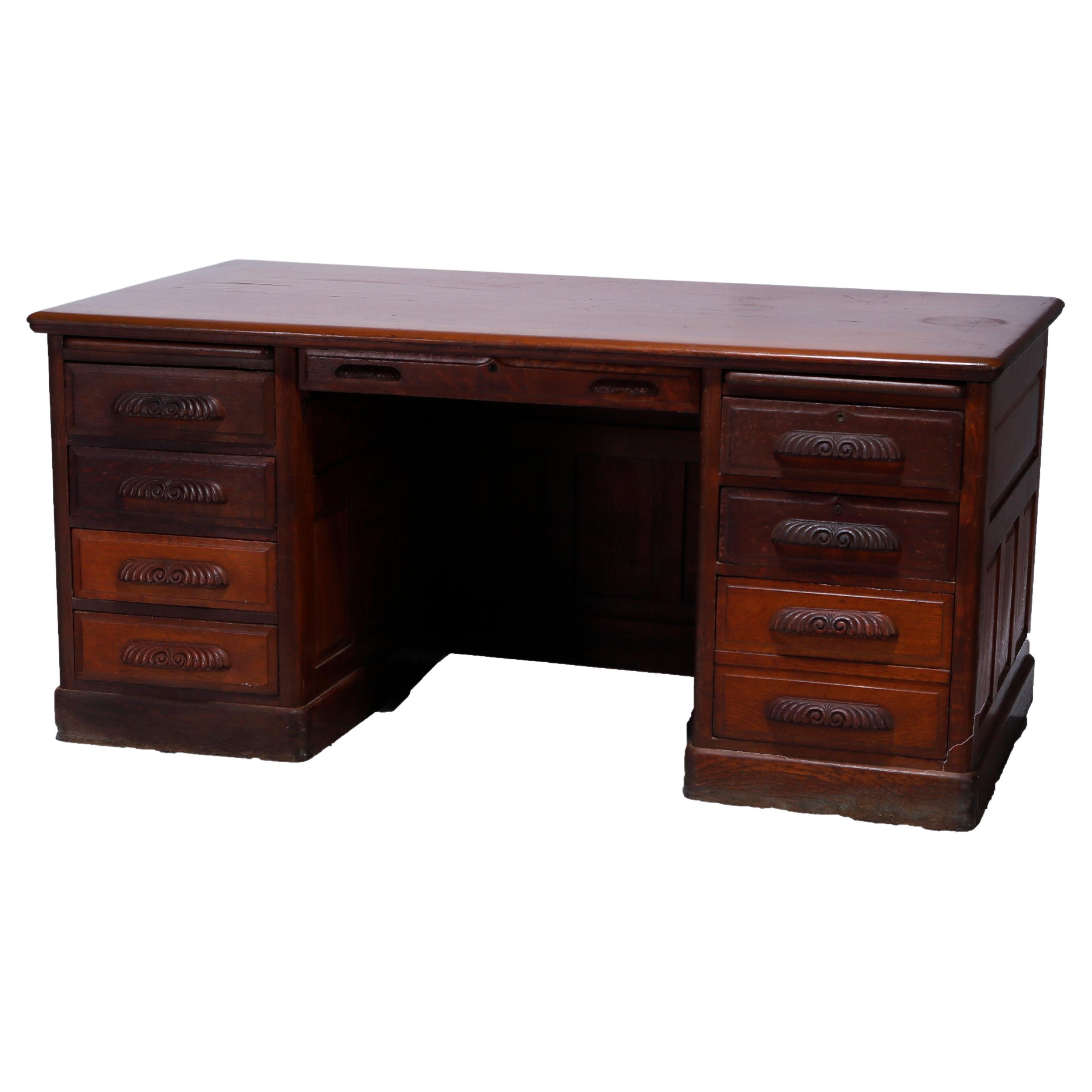Antique Quarter Sawn Oak Knee Hole Desk with Raised Panels & Carved Pulls C1900
