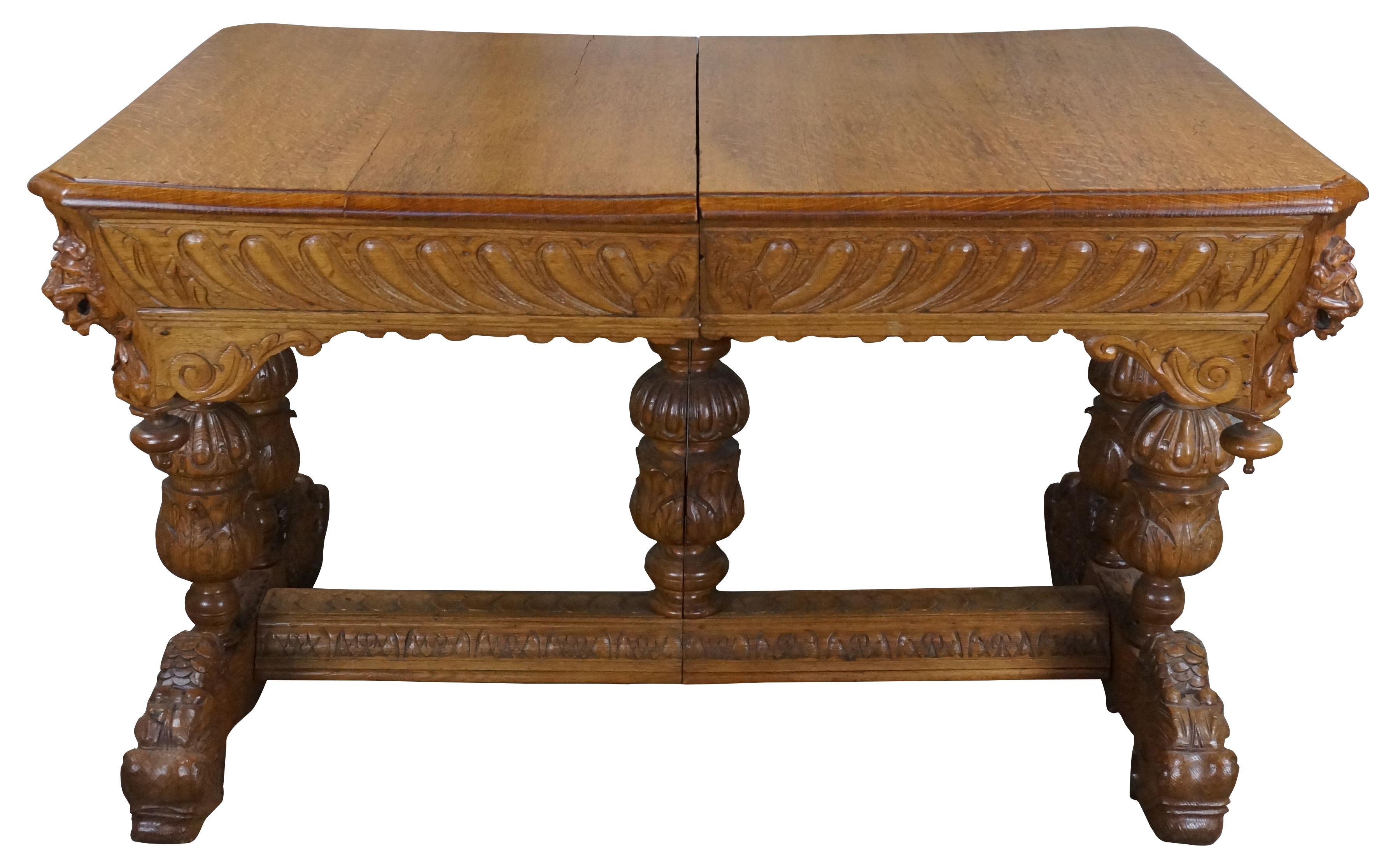 Antique 19th Century Figural French Renaissance Revival / Elizabethan style Dining or Library Table. A rectangular form made from oak with a quartersawn top. Features a thick gadrooned apron with 