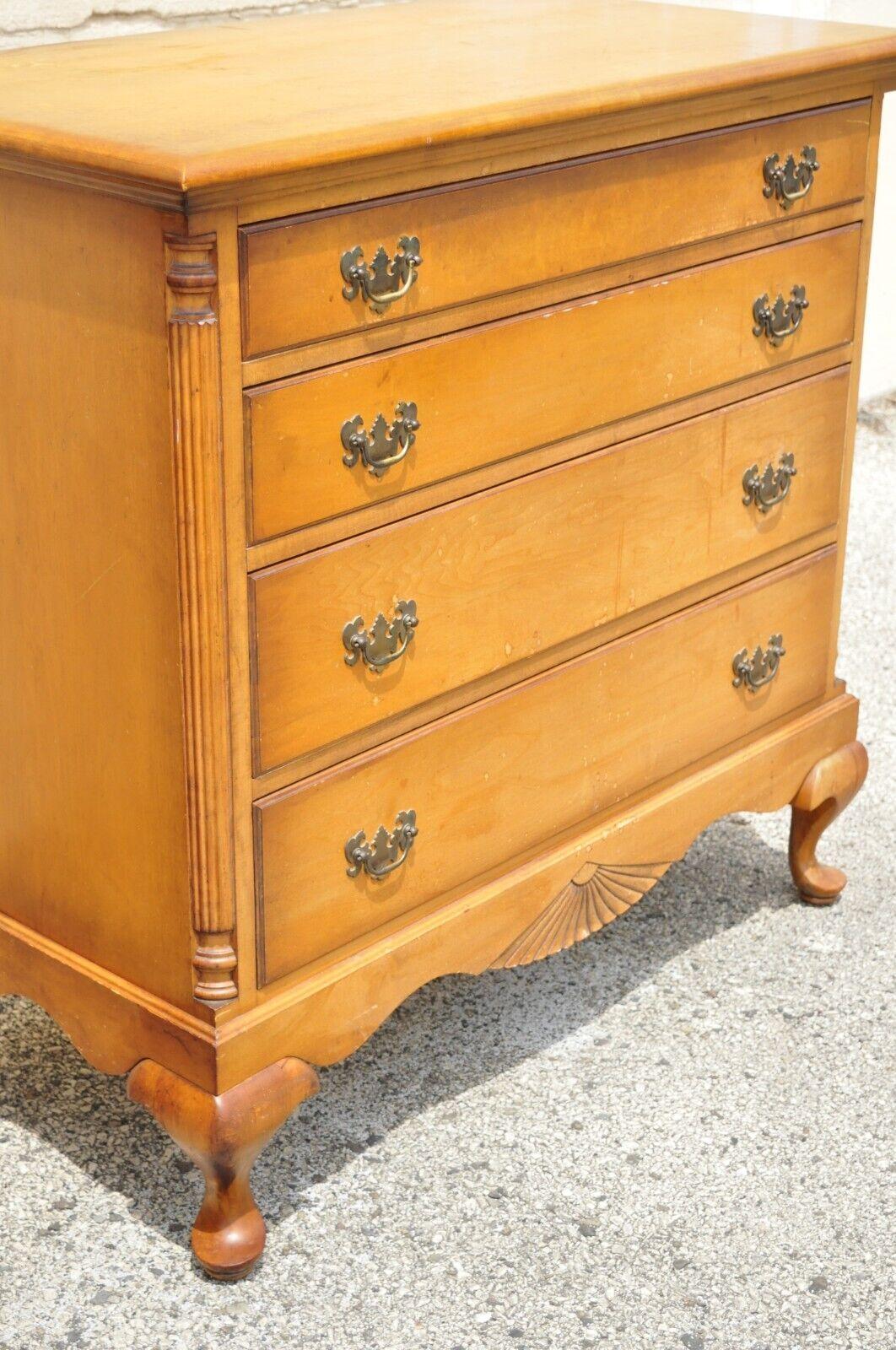 antique dresser with wooden wheels