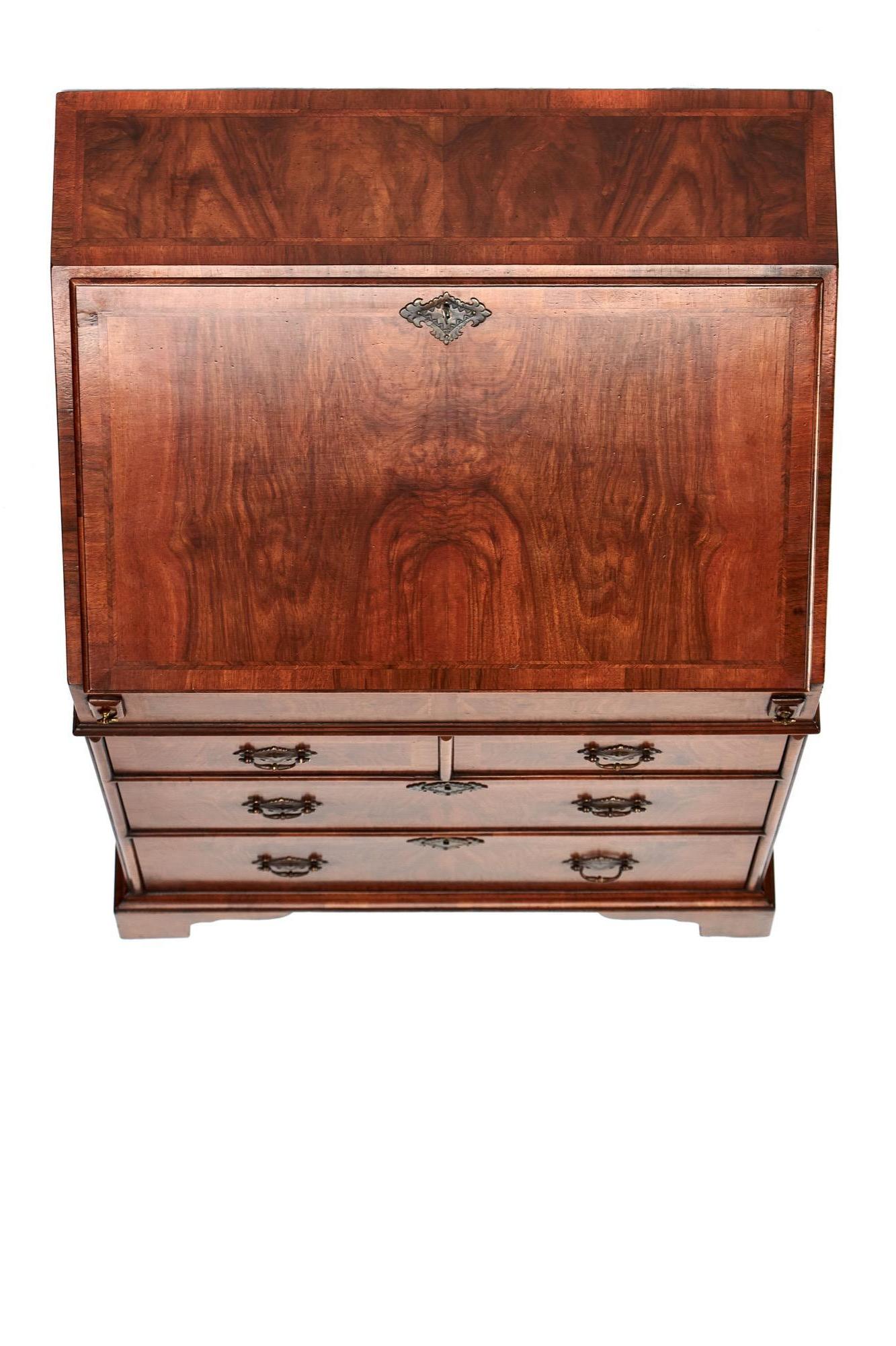 Antique Queen Anne revival burr walnut bureau having a beautiful burr walnut top, burr walnut fall opening to reveal a fitted interior consisting of pigeon holes, drawers, centre cupboard and drop well compartment, four burr walnut drawers with