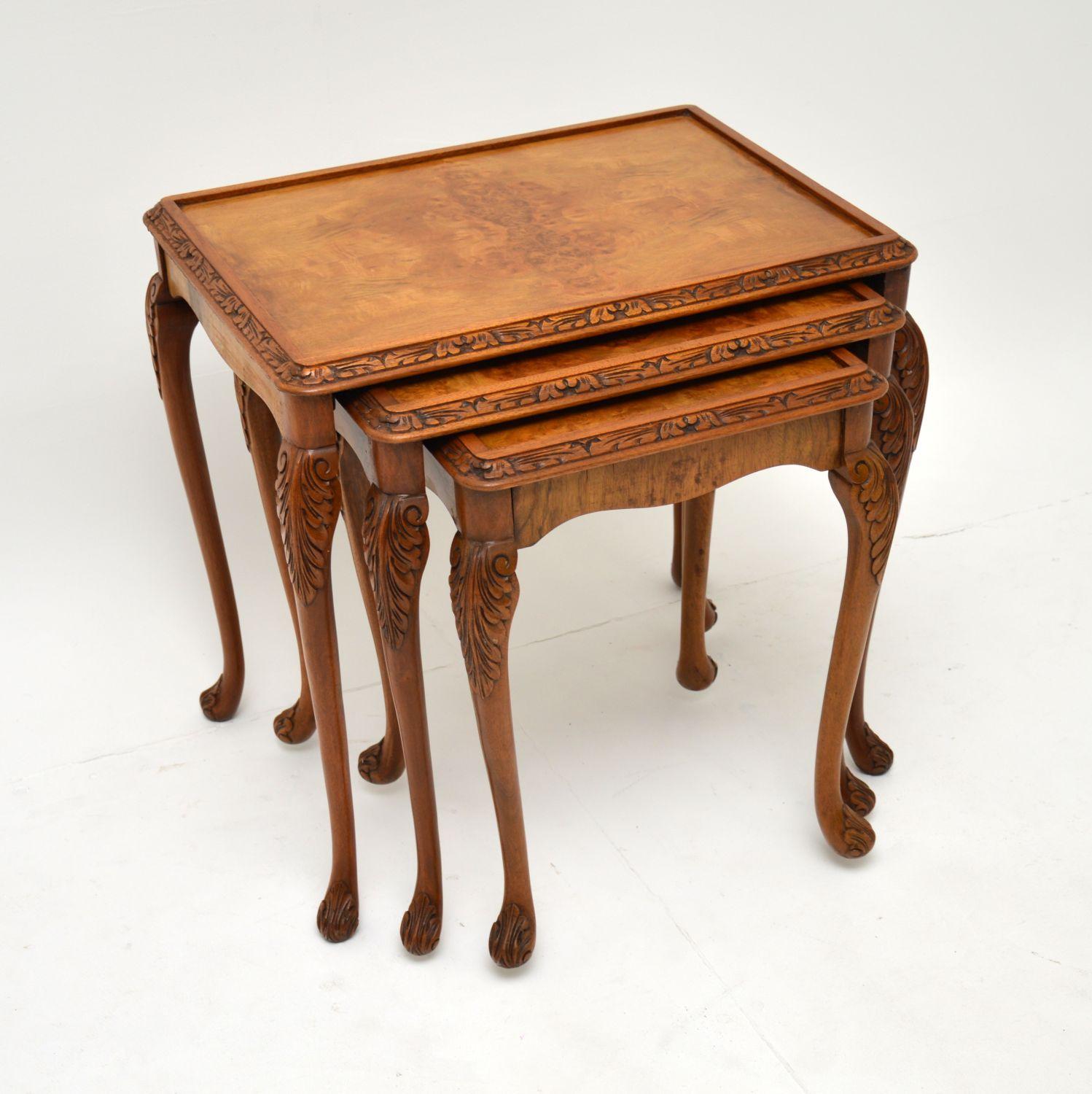 A lovely burr walnut nest of three tables in the antique Queen Anne style. These were made in England, they date from around the 1930’s.

The quality is fantastic, they have good carving on the top edges, legs, feet and have stunning burr walnut